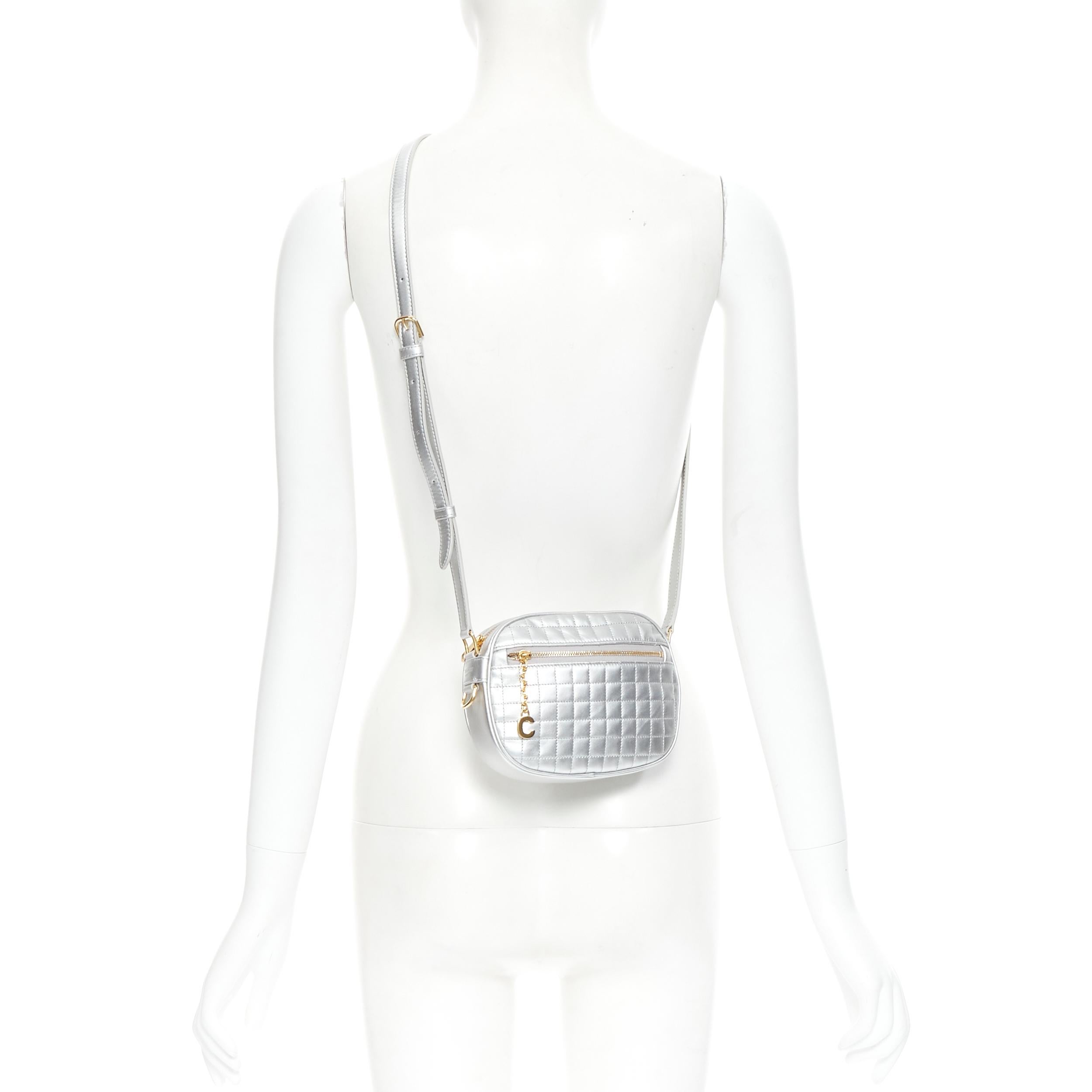 new CELINE Hedi Slimane 2019 C Charm silver checked quilted crossbody camera bag 
Reference: TGAS/B01433 
Brand: Celine 
Designer: Hedi Slimane 
Model: Small C Charm camera bag 
Collection: 2019 
Material: Leather 
Color: Silver 
Pattern: Solid