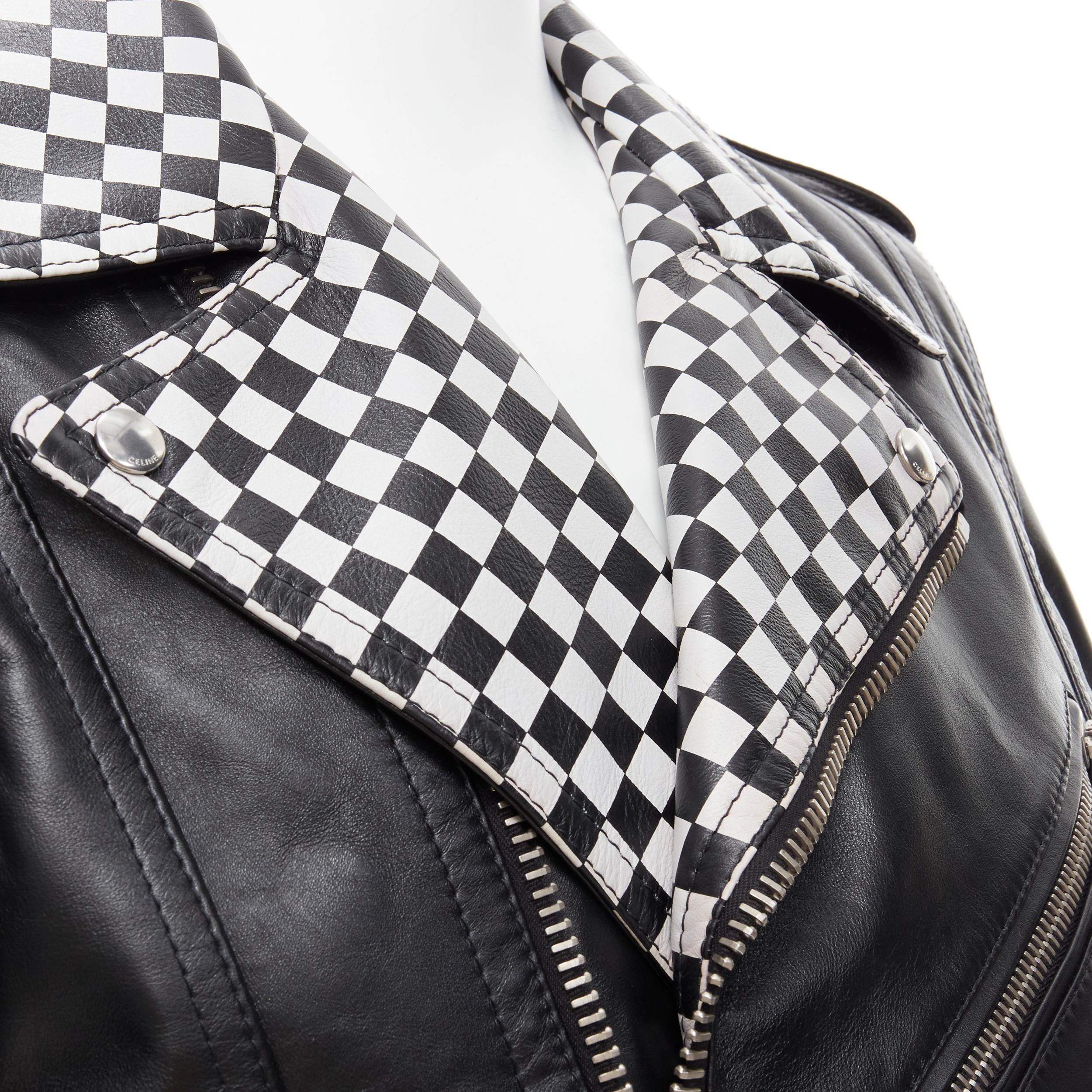 new CELINE Hedi Slimane 2019 Runway black checkered studed biker jacket EU52 XL
Reference: TGAS/B01977
Brand: Celine
Designer: Hedi Slimane
Collection: Fall Winter 2019 Runway
Material: Leather
Color: Black
Pattern: Checker
Closure: Zip
Extra