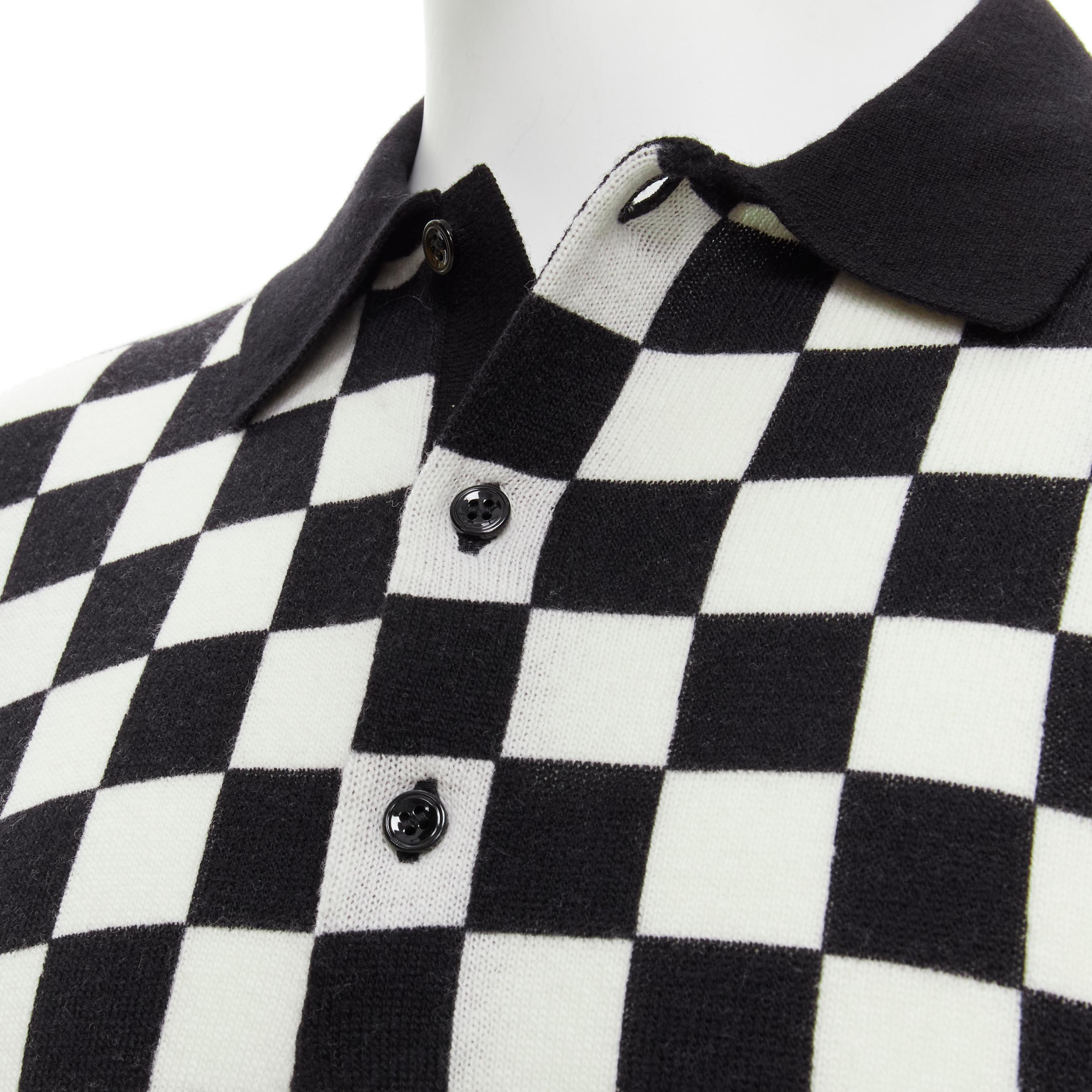 new CELINE Hedi Slimane 2019 Runway black white Damier checkered polo sweater M 
Reference: TGAS/B01978 
Brand: Celine 
Designer: Hedi Slimane 
Collection: Spring Summer 2019 Runway 
Material: Wool 
Color: Black 
Pattern: Checked 
Extra Detail: From