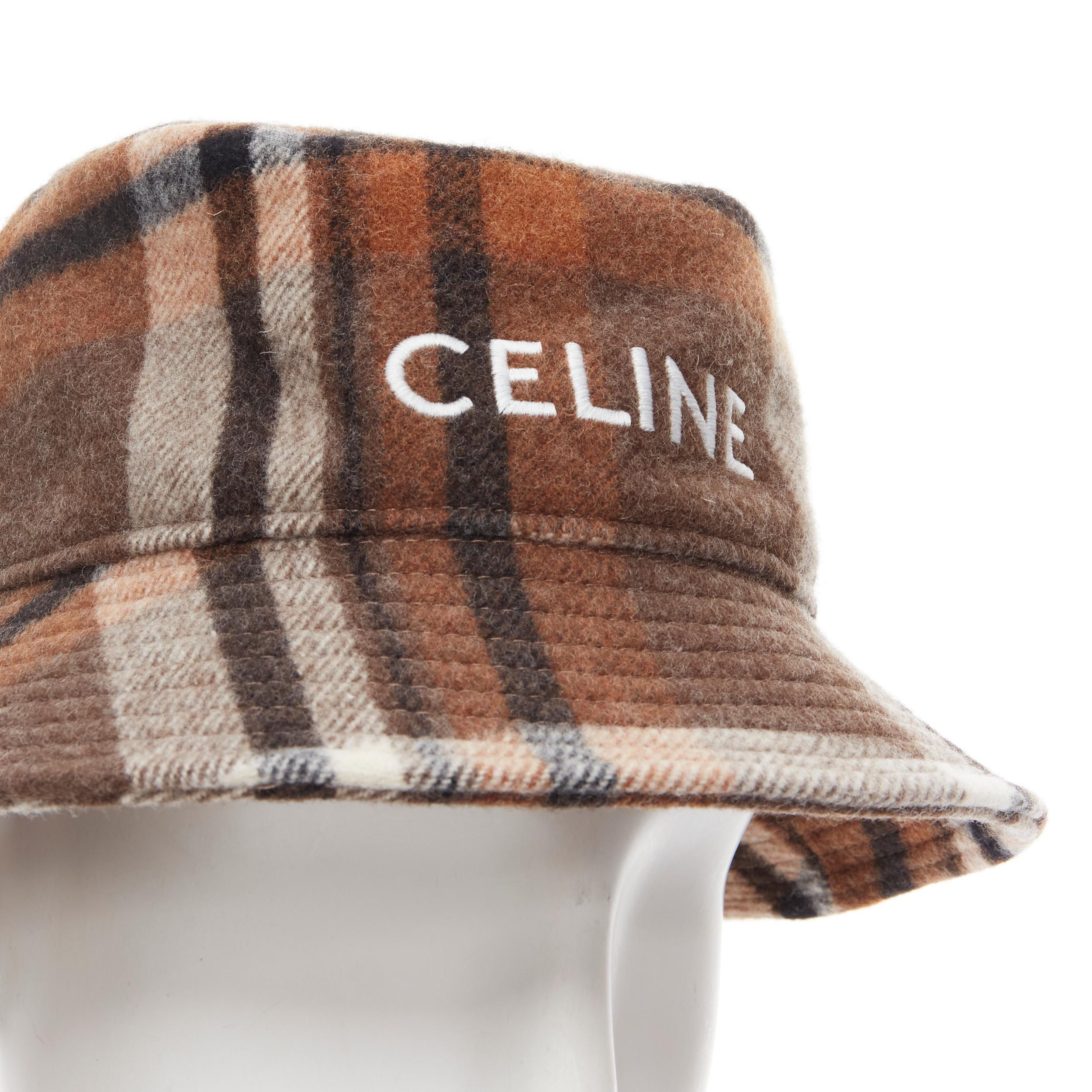 new CELINE Hedi Slimane brown check wool felt logo embroidery bucket hat M 57cm 
Reference: MELK/A00160 
Brand: Celine 
Designer: Hedi Slimane 
Material: Wool 
Color: Brown 
Pattern: Check 
Made in: France 

CONDITION: 
Condition: New with tags.