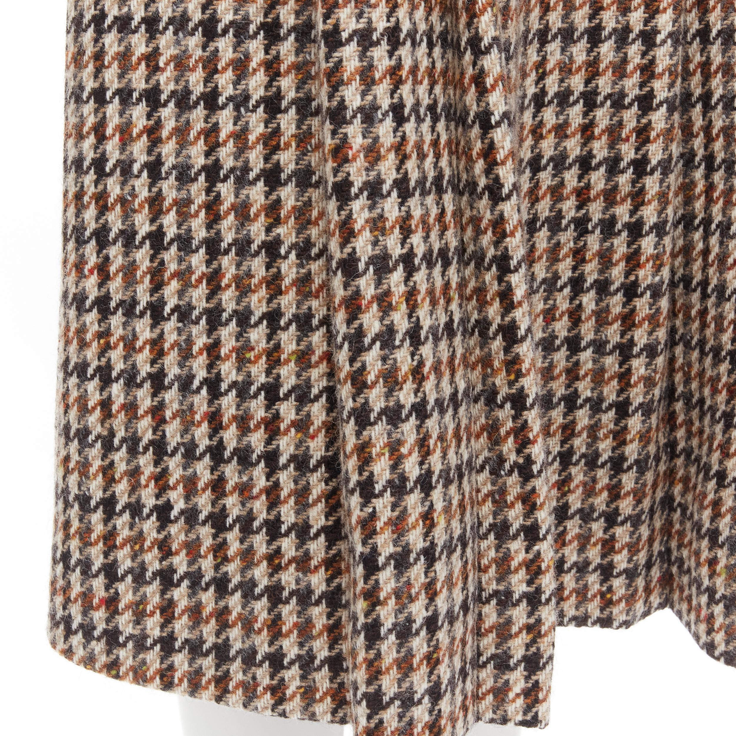 Nouveauté Celine Hedi Slimane Prince Of Wales jupe plissée en tweed de laine pied-de-poule FR36 S 
Référence : MELK/A00061 
Marque : Celine 
Designer : Hedi Slimane 
MATERIAL : Laine 
Couleur : marron 
Motif : Pied de poule 
Fermeture : Zip 
Détail