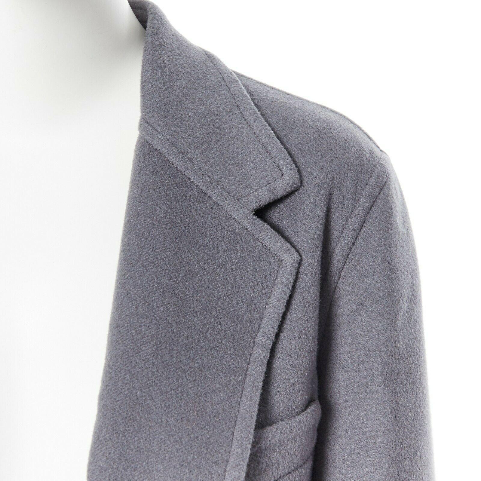 new CELINE PHOEBE PHILO 100% cashmere classic grey blue over coat FR36 S

CELINE BY PHOEBE PHILO
Dusk grey with blue tint. 100% cashmere. 
Classic overcoat style. Minimal design. Notch lapel front. 
One patched front pocket and two patched side