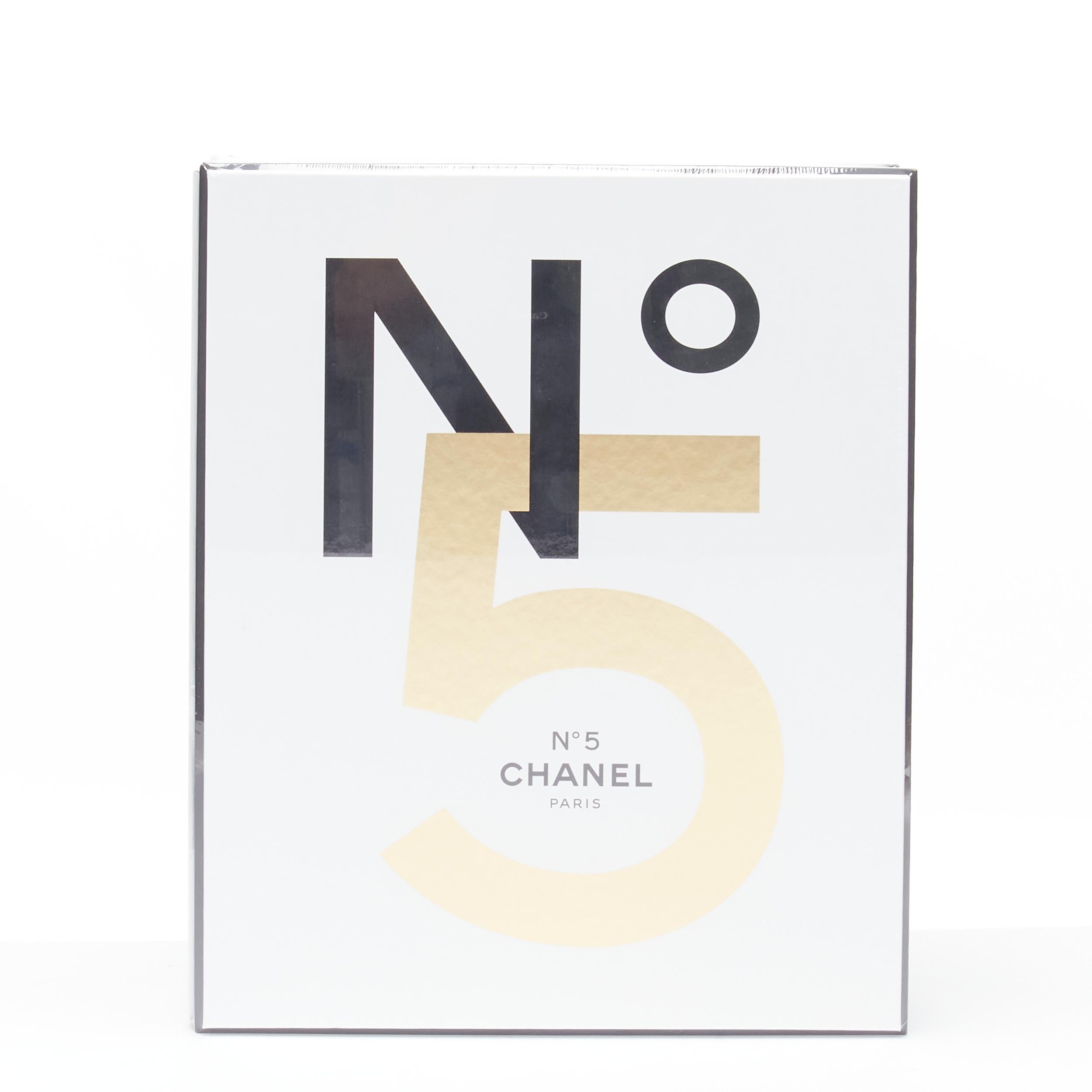 new CHANEL 2021 No.5 Story of a Perfume hardcover book Pauline Dreyfus 
Reference: JOMK/A00037 
Brand: Chanel 
Designer: Pauline Dreyfus 
Material: Paper 
Extra Detail: Hardback. 426 pages. Dimensions 265 x 325 x 103mm. 6,320g. Publication date 18