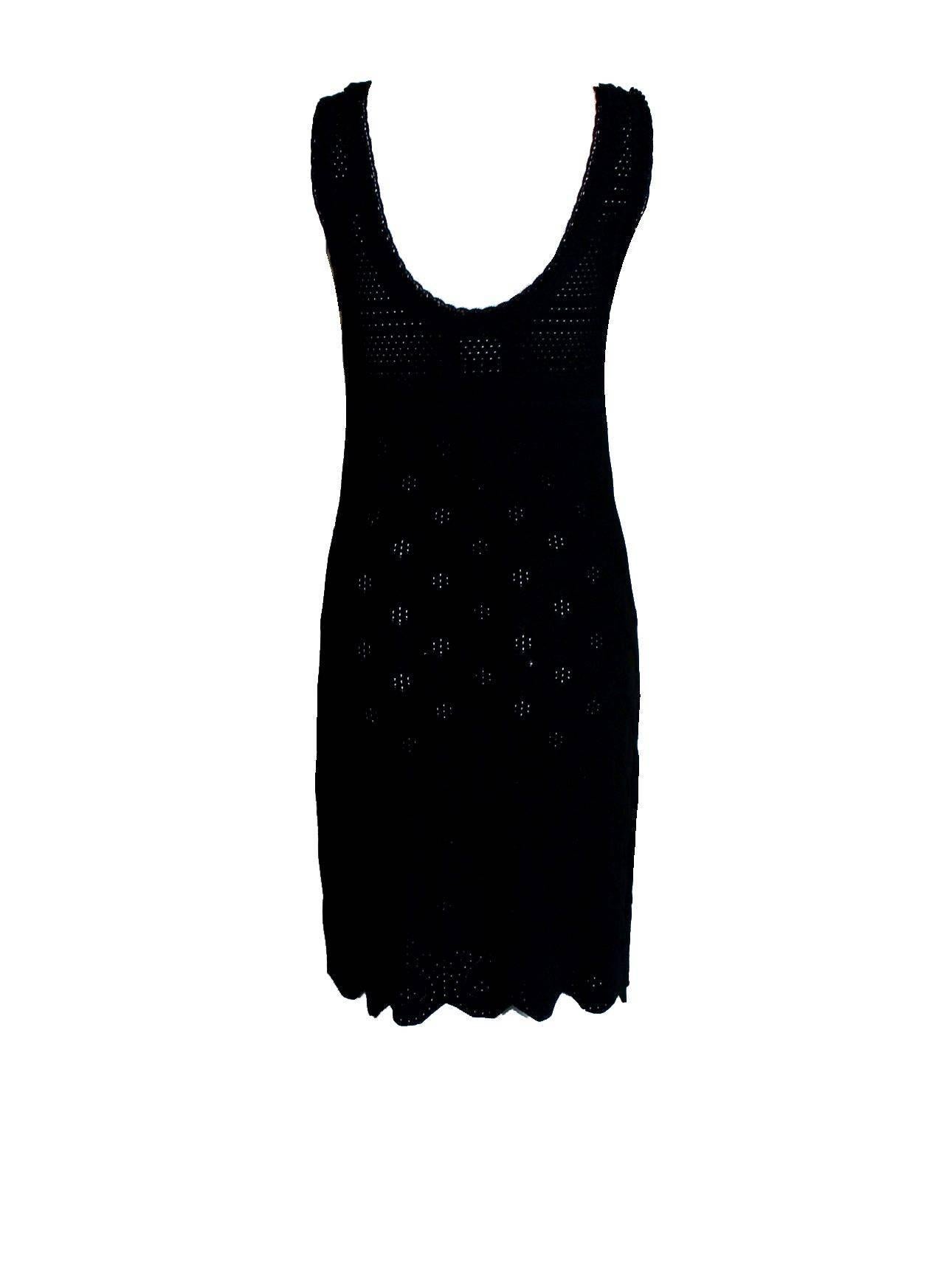 Lovely new interpretation of the timeless Chanel classic little black dress
A true Chanel signature piece that will last for many years
3D crochet knit
Two front pockets
CC logo buttons
Simply slips on
Made in France
Dry Clean Only
Size 36
Brandnew