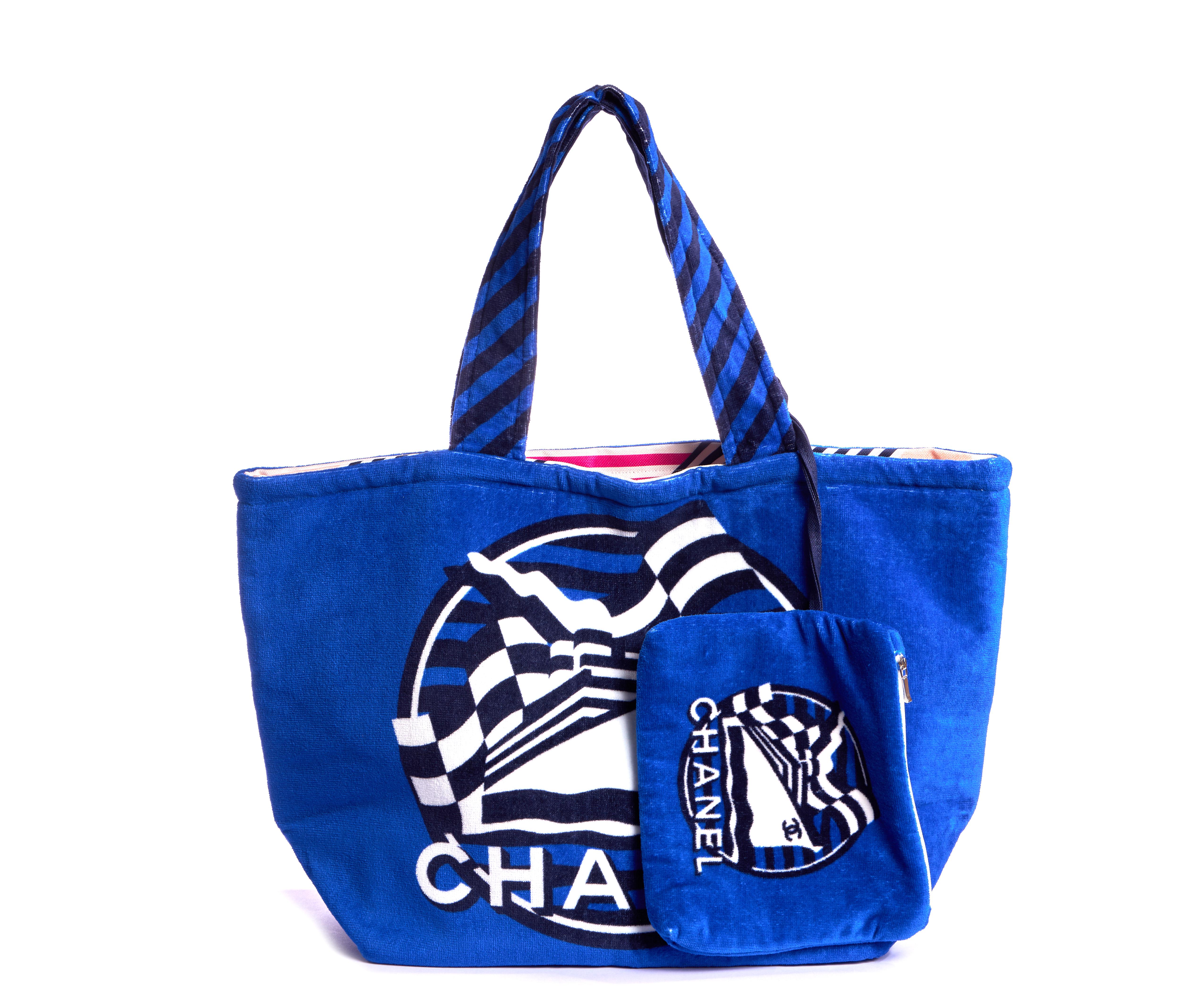 Chanel brand new beach bag in electric blue terry cloth with colorful lined interior. Detachable interior pouch can be worn separately. Cruise 2019 collection. Top opening 21.5, handle drop 10