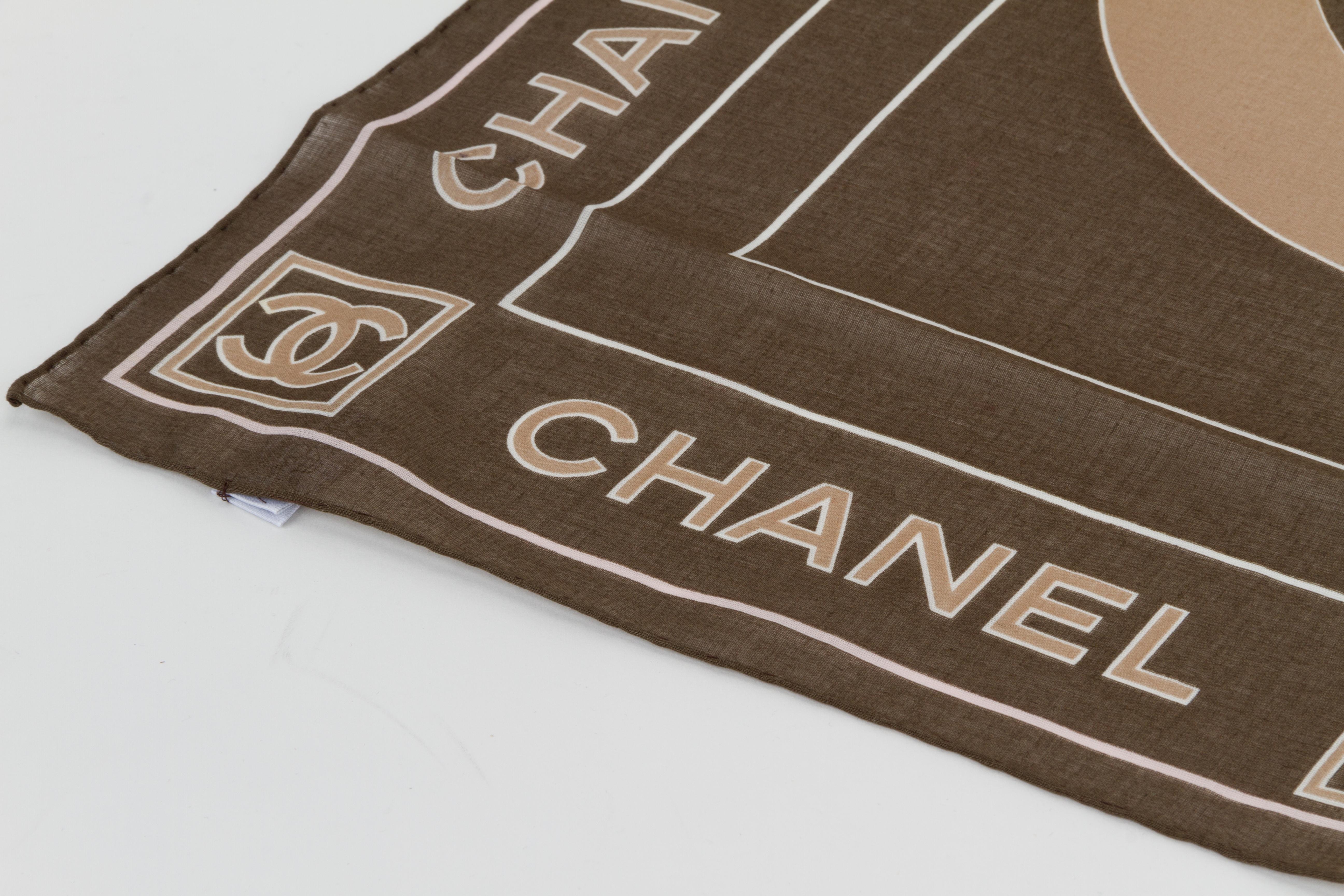 Chanel brown 100% cotton scarf with coffee center logo. Brand new. Small size .