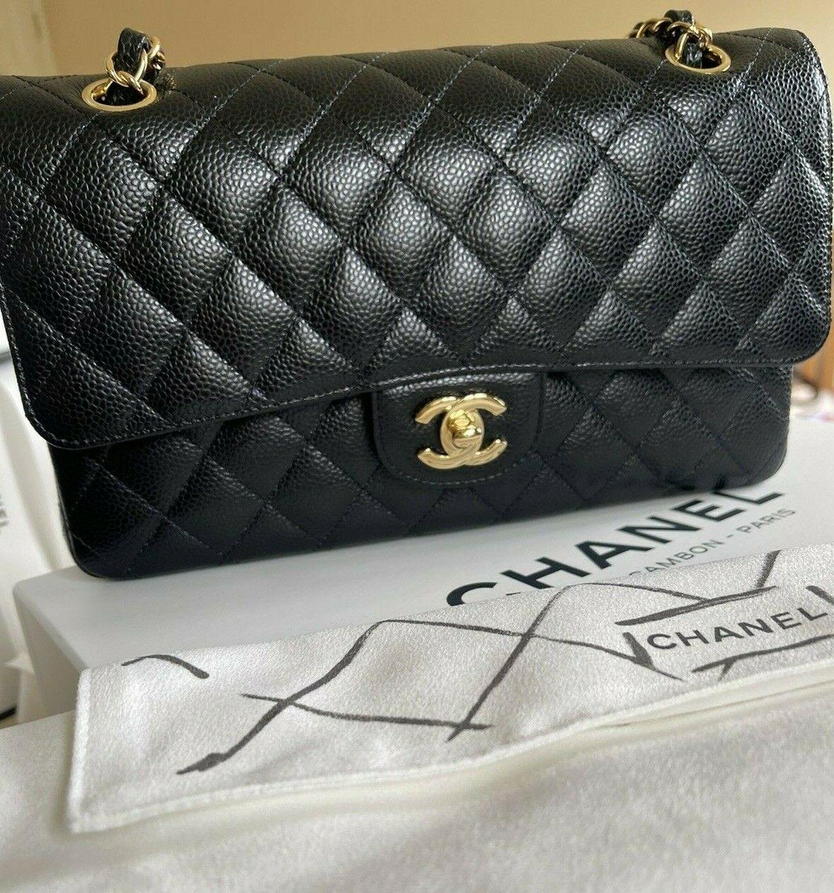 Just stunning.! This Chanel Medium Classic Flap bag  is just breathtaking. The black caviar leather next to the gold hardware trimming is just exquisite. Purchased from the Mothership Store, Rue Cambon, Paris and in Brand New condition.

 BRAND
