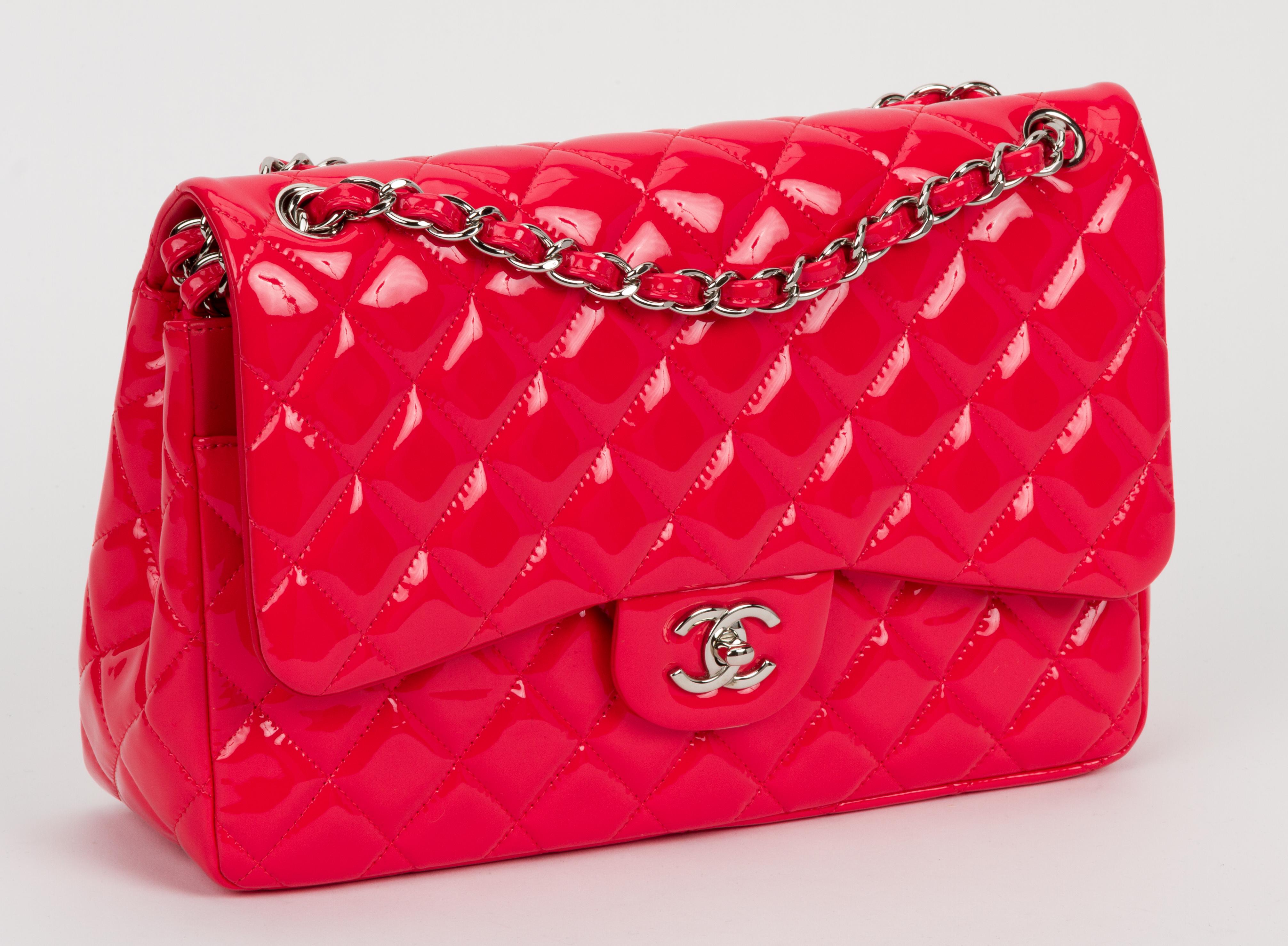 Chanel new jumbo classic double flap. Coral patent leather quilted with silver tone metal hardware. Single drop 24