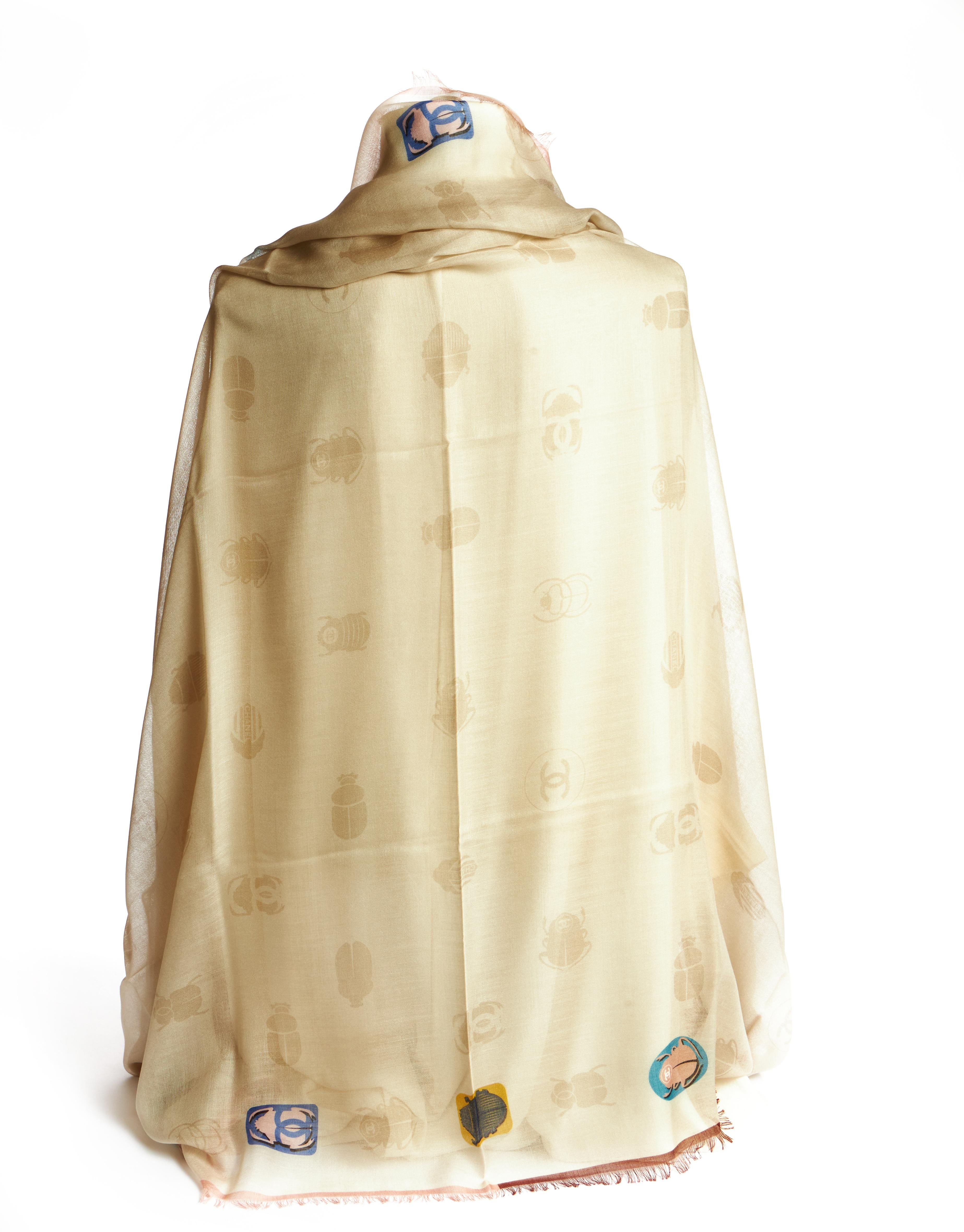 Chanel brand new large shawl in cream with beetle logo design. 80% cashmere, 20% silk. Comes with original care tag.
