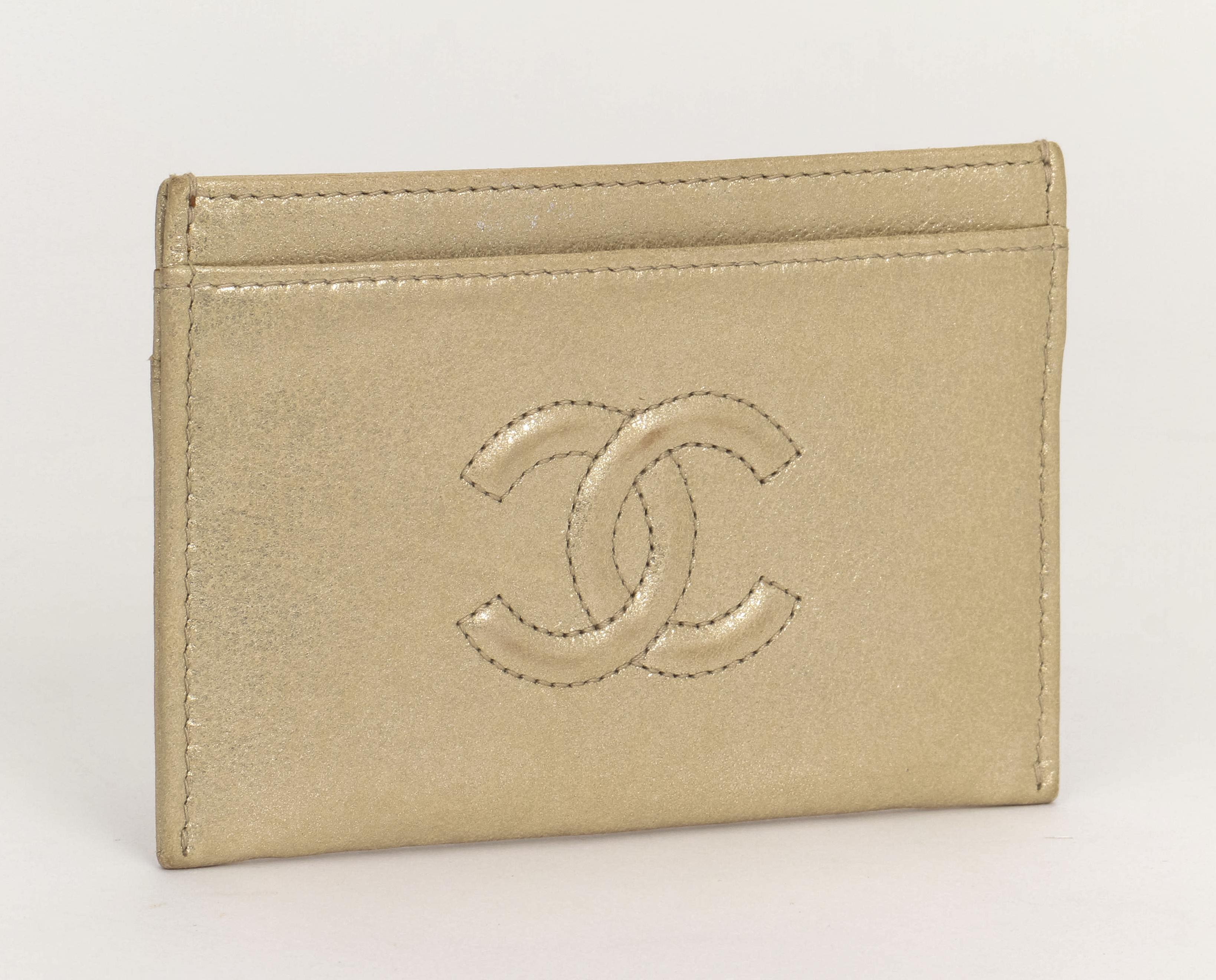 Chanel brand new card case light gold leather with original velvet pouch
