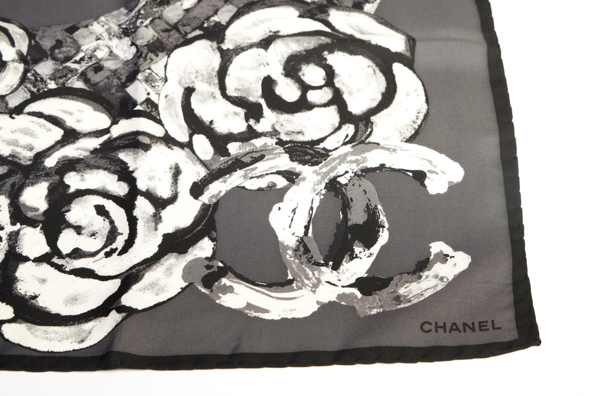 New Chanel gray and black camellia and logo silk scarf. Hand rolled edges.