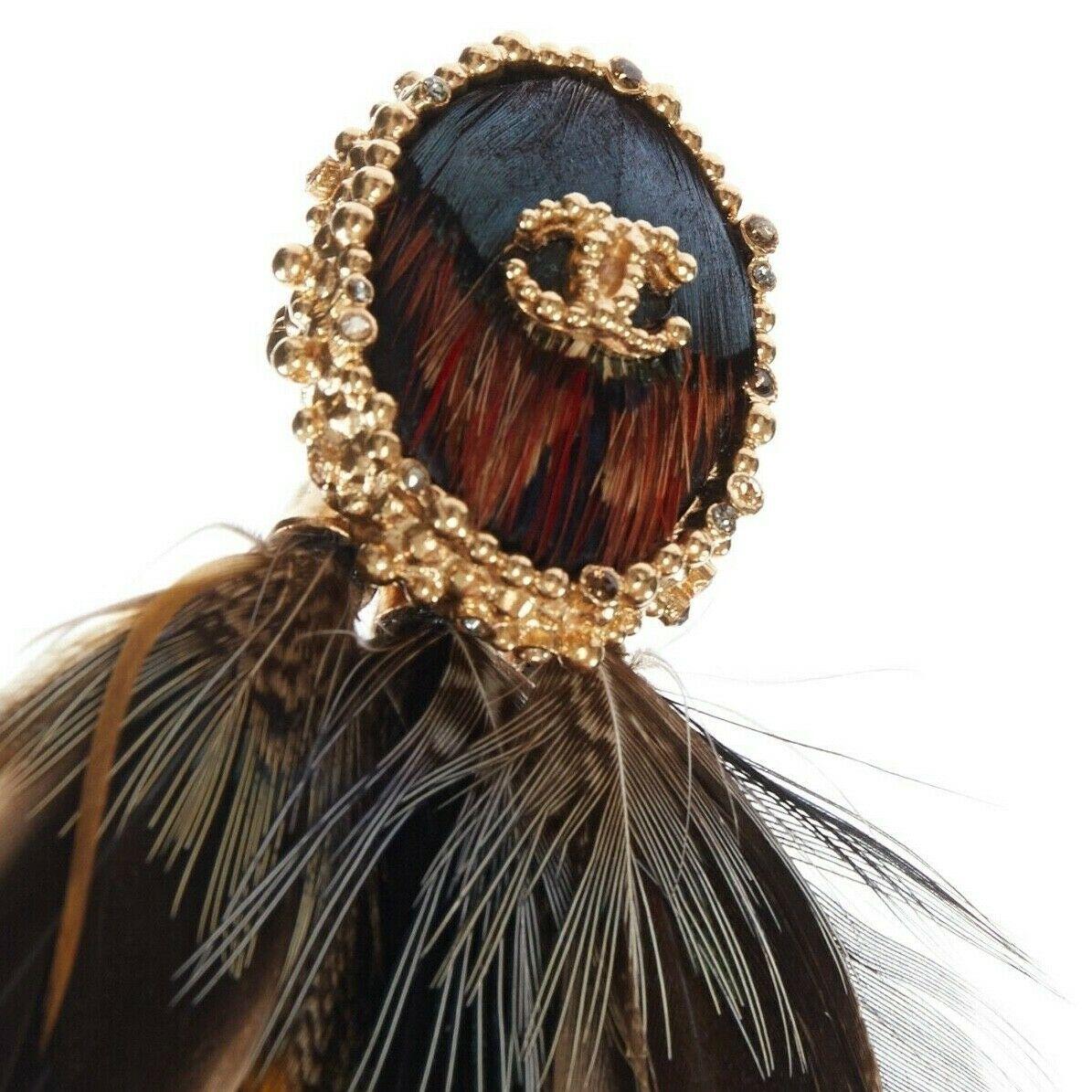 chanel feather brooch