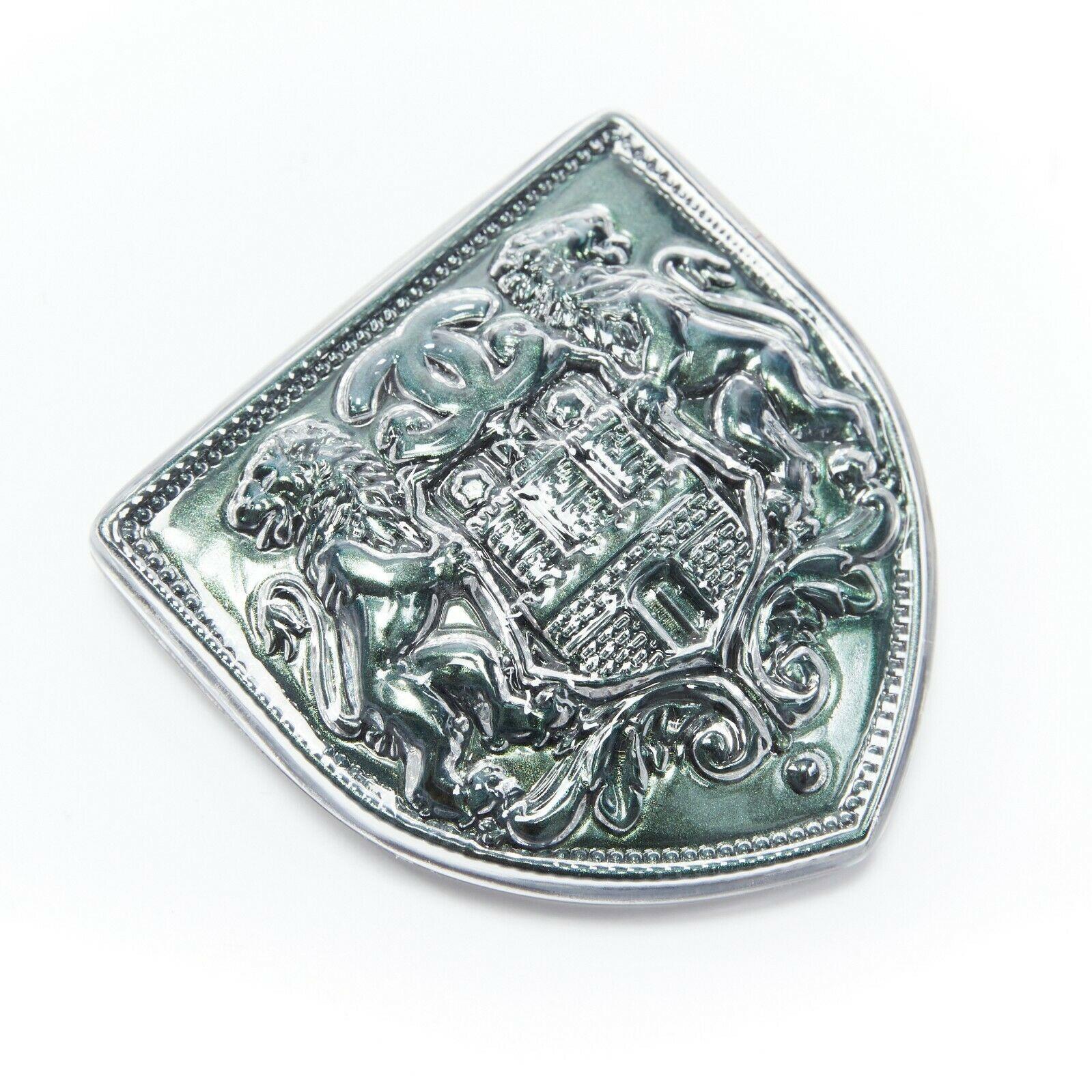 chanel shield brooch