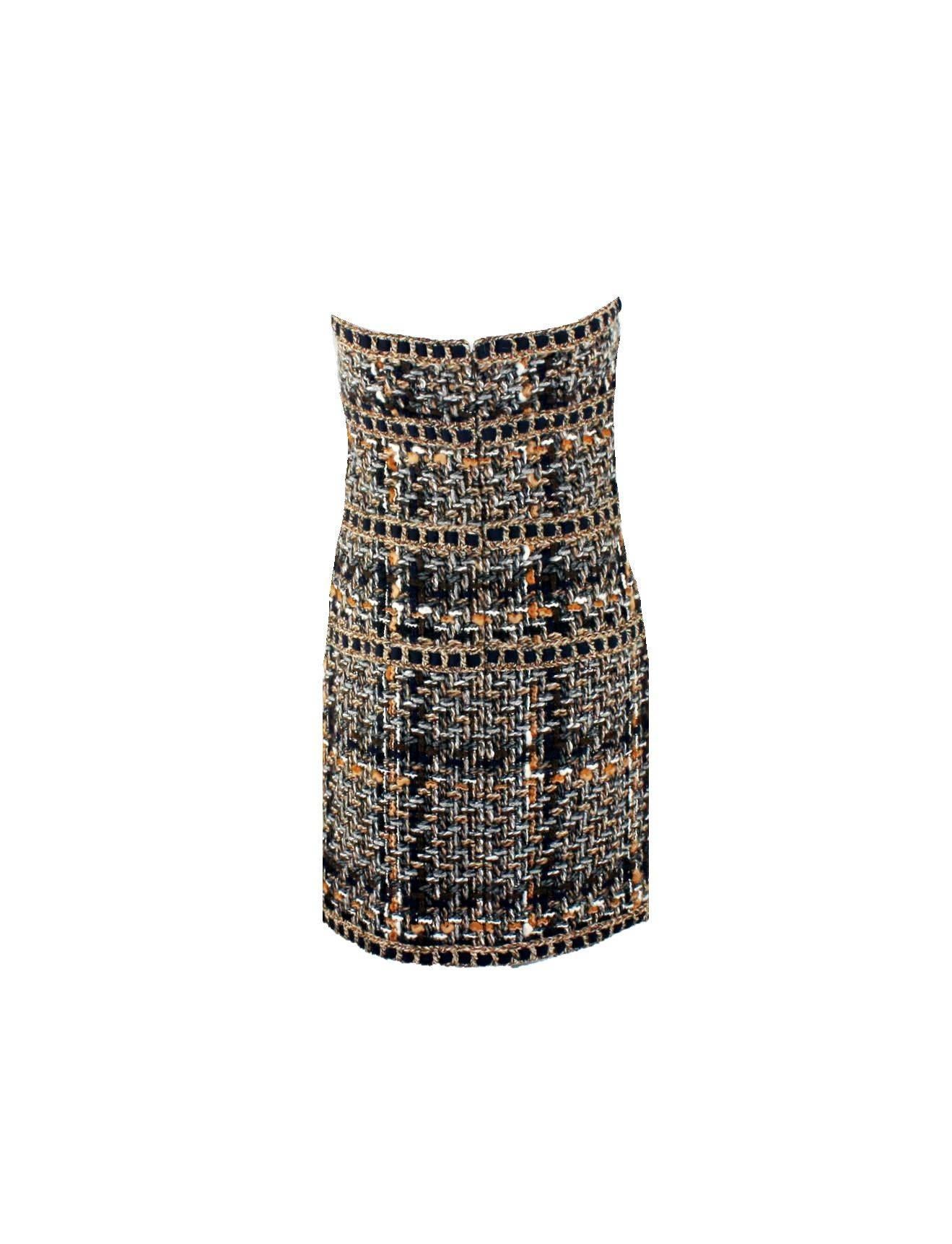 Stunning CHANEL signature tweed dress
Beautiful hand-braided details
Finest fantasy tweed fabric exclusively produced for Chanel by Maison Lesage
Fully lined with Chanel CC logo silk
Rubber band inside for a perfect fit
Closes with zipper in the