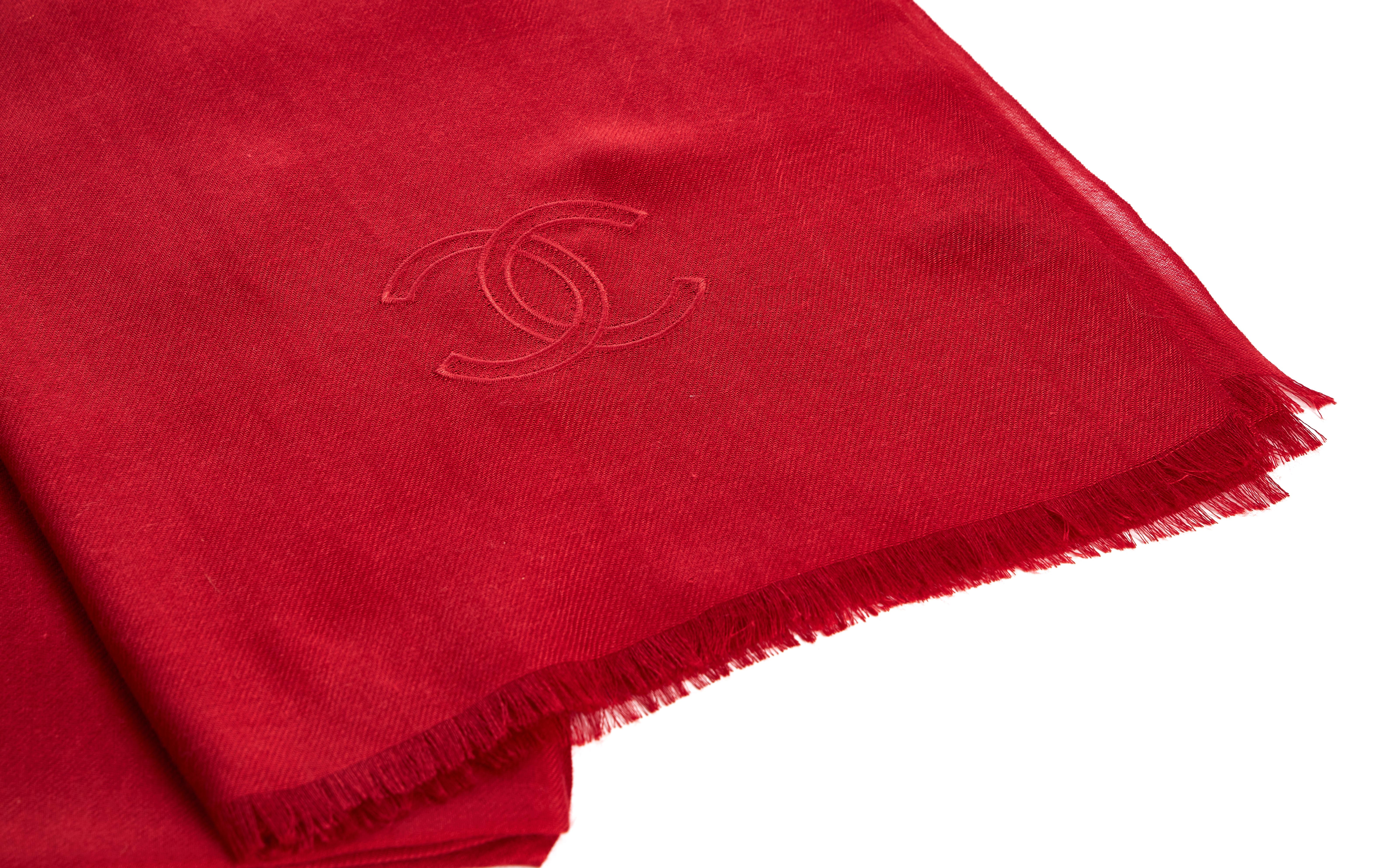 Chanel brand new red cashmere shawl with cc embroidered logo. 70% cashmere, 30% silk. Comes with original care tag.