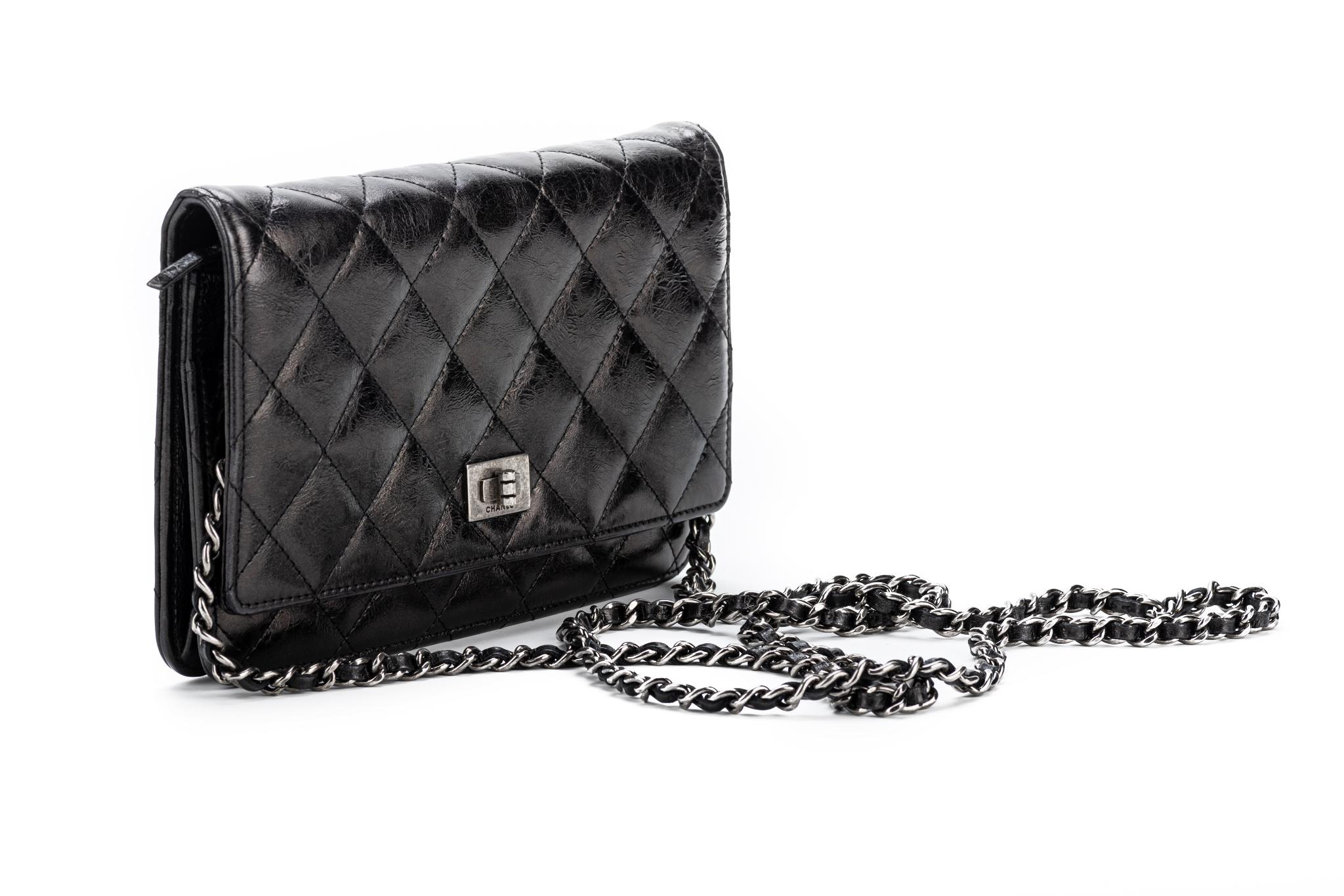 Chanel reissue quilted black leather cross body wallet on a chain. Shoulder drop 25
