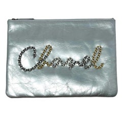 NEW Chanel Silver Chain Logo Leather Clutch Bag
