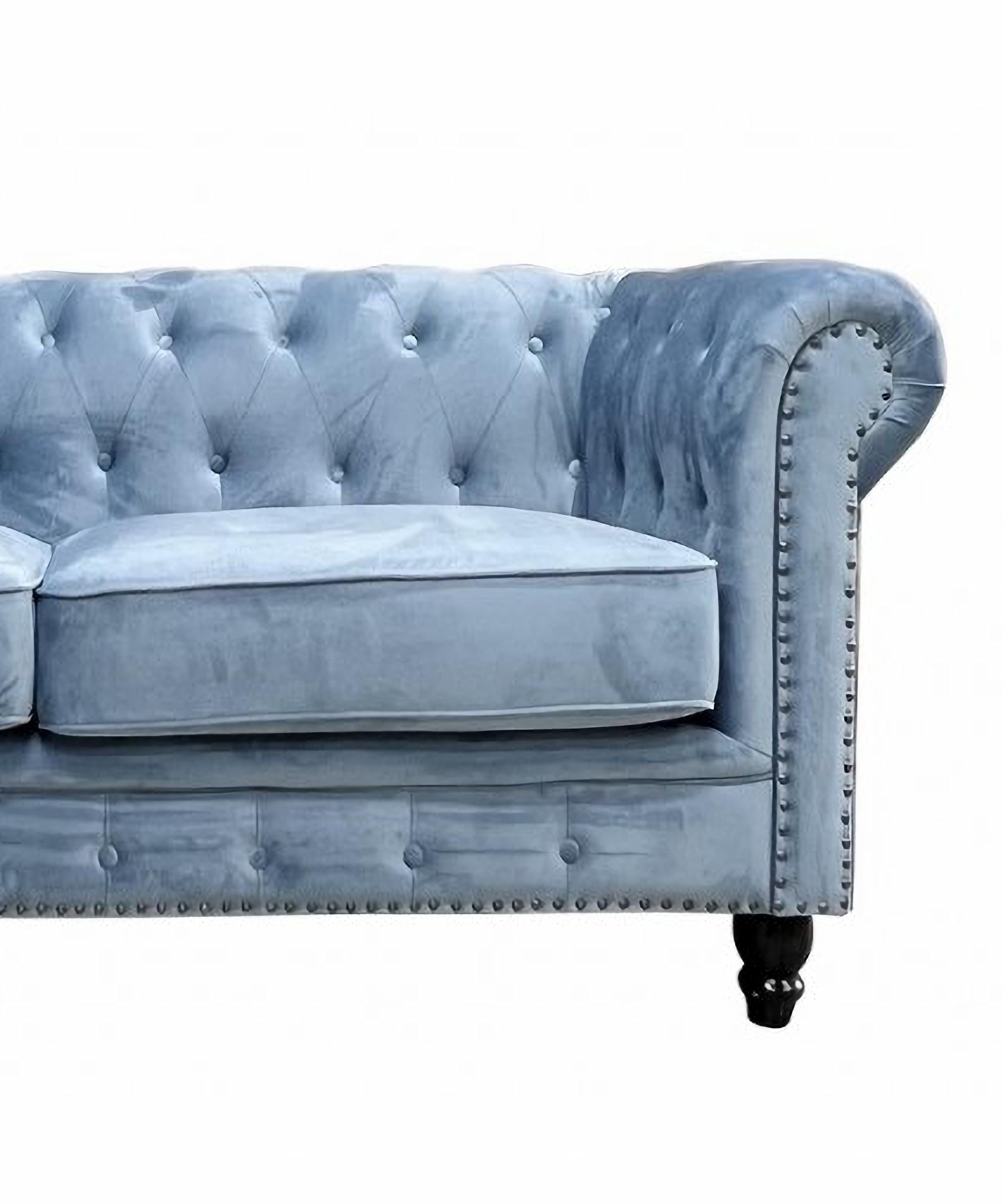 Chester Premium 3-seater sofa, dusky blue velvet upholstery

-Design sofa, 3 seats.

-Made with a solid wooden structure.

-High density polyurethane foam.

-Upholstered in navy blue velvet fabric

-2-seater sofa to match,