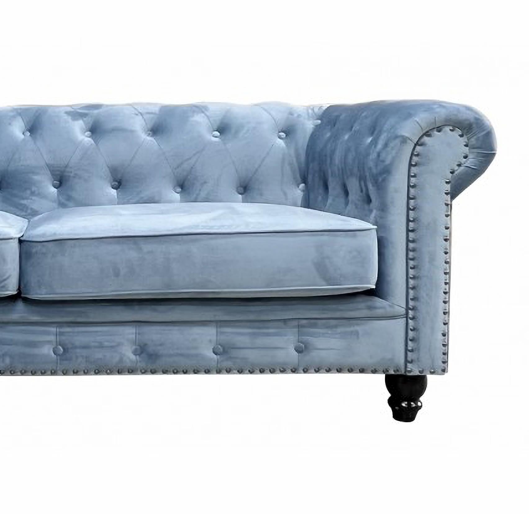 Chester Premium 3-seater sofa, dusky blue velvet upholstery

-Design sofa, 3 seats.

-Made with a solid wooden structure.

-High density polyurethane foam.

-Upholstered in navy blue velvet fabric

-2-seater sofa to match,