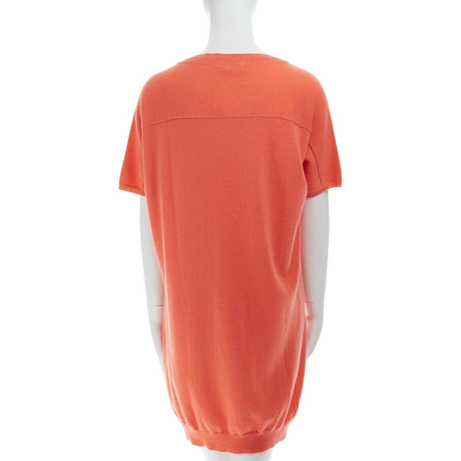 new CHLOE 100% cashmere peach orange dual collar short sleeve knit dress S

CHLOE
100% cashmere. Peach orange. Dual layered neckline. 
Short sleeves. wide cut. Ribbed hem. Casual knit dress. 
Made in China.

CONDITION
New with tags.

SIZING
Designer