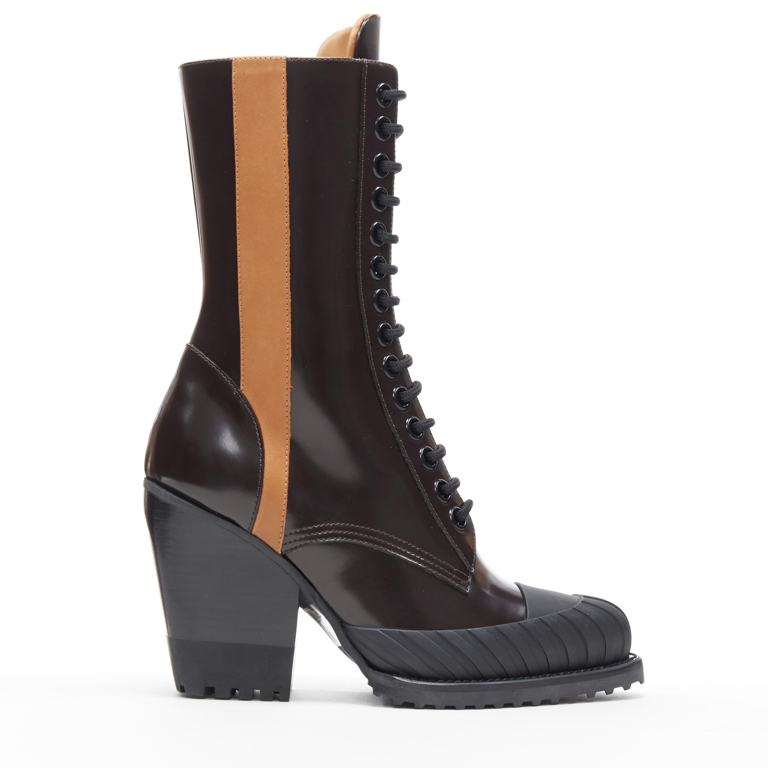 new CHLOE Runway Rylee brown glossy leather block heel heel rubber toe boot EU37
Brand: Chloe
Model Name / Style: Rylee
Material: Leather
Color: Brown
Pattern: Solid
Closure: Lace up
Extra Detail: Signature Runway Rylee boots by Chloe. Ankle boots.