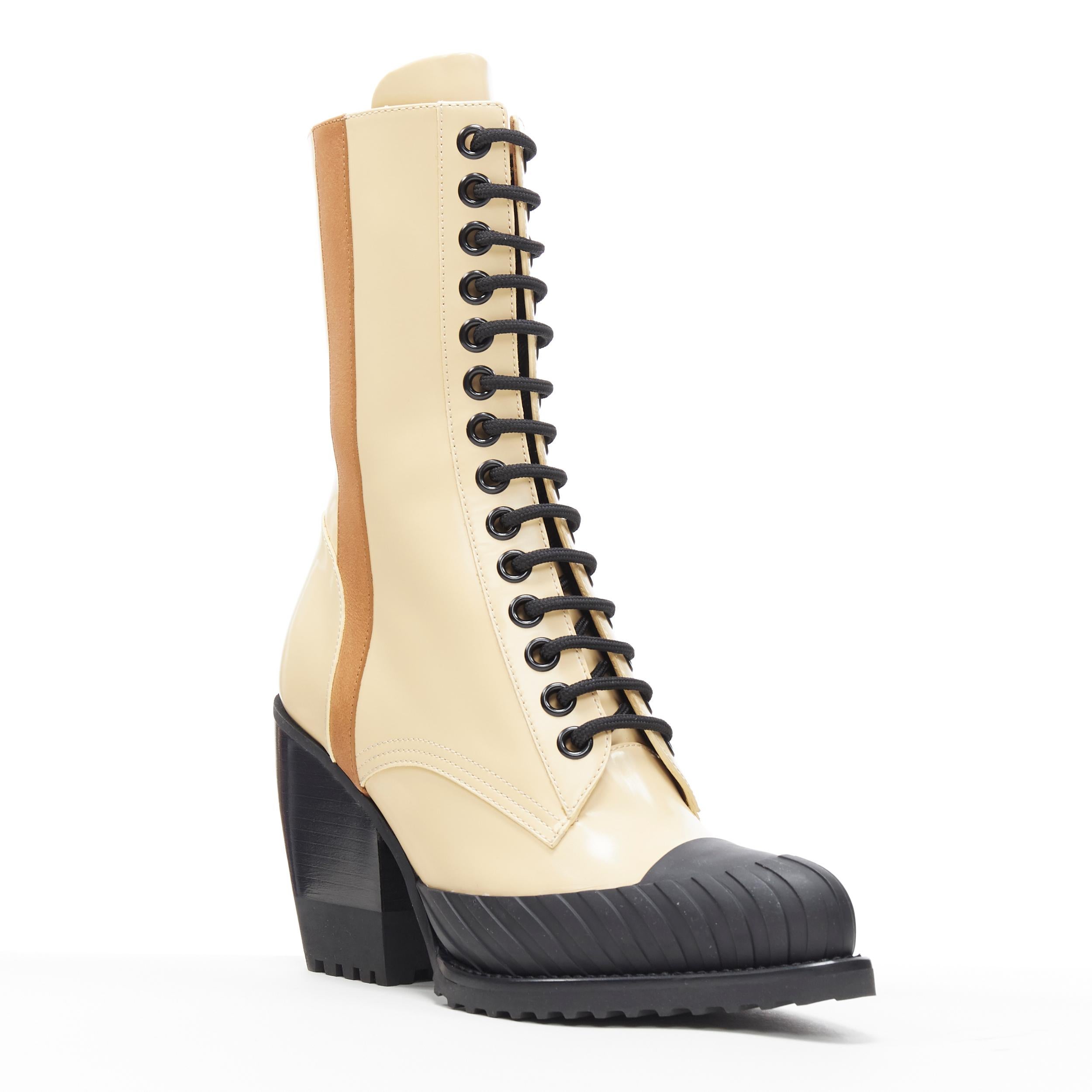 new CHLOE Runway Rylee cream brown leather block heel heel rubber toe boot EU41
Brand: Chloe
Model Name / Style: Rylee
Material: Leather
Color: Beige
Pattern: Solid
Closure: Lace up
Extra Detail: Signature Runway Rylee boots by Chloe. Ankle boots.