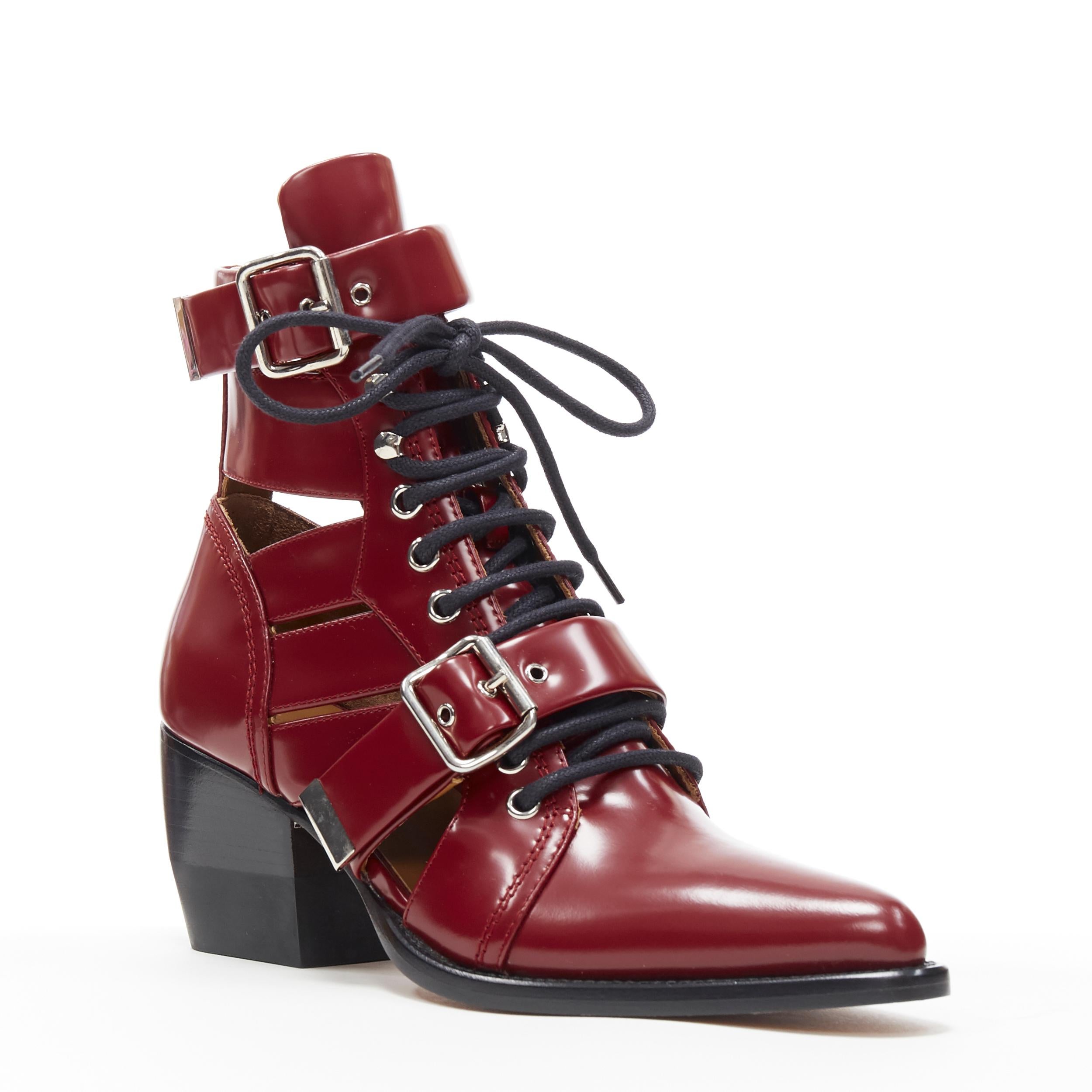 new CHLOE Rylee burgundy red leather cut out buckled pointy ankle boot EU38.5 
Reference: TGAS/A05600 
Brand: Chloe 
Material: Leather 
Color: Burgundy 
Pattern: Solid 
Closure: Lace Up 
Extra Detail: Signature Rylee boots by Chloe. Runway style.