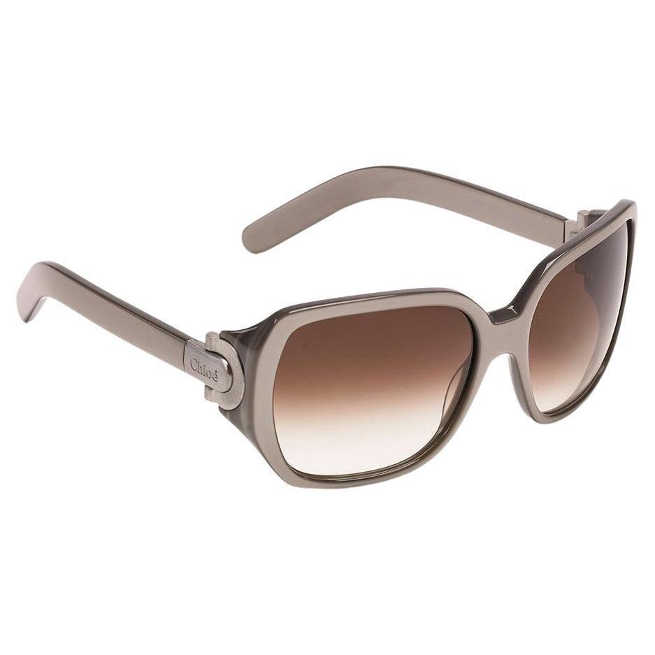 Chloe Coveted Sunglasses
  Brand New
* Stunning Silver Beige Frames
* Brushed Stainless Hardware
* Seen on Many Stars
* Chloe Details on Temples
* Made in France
* 100% UVA/UVB Protection
* With Box, Case, Cleaning Clothing & Authenticity Cards