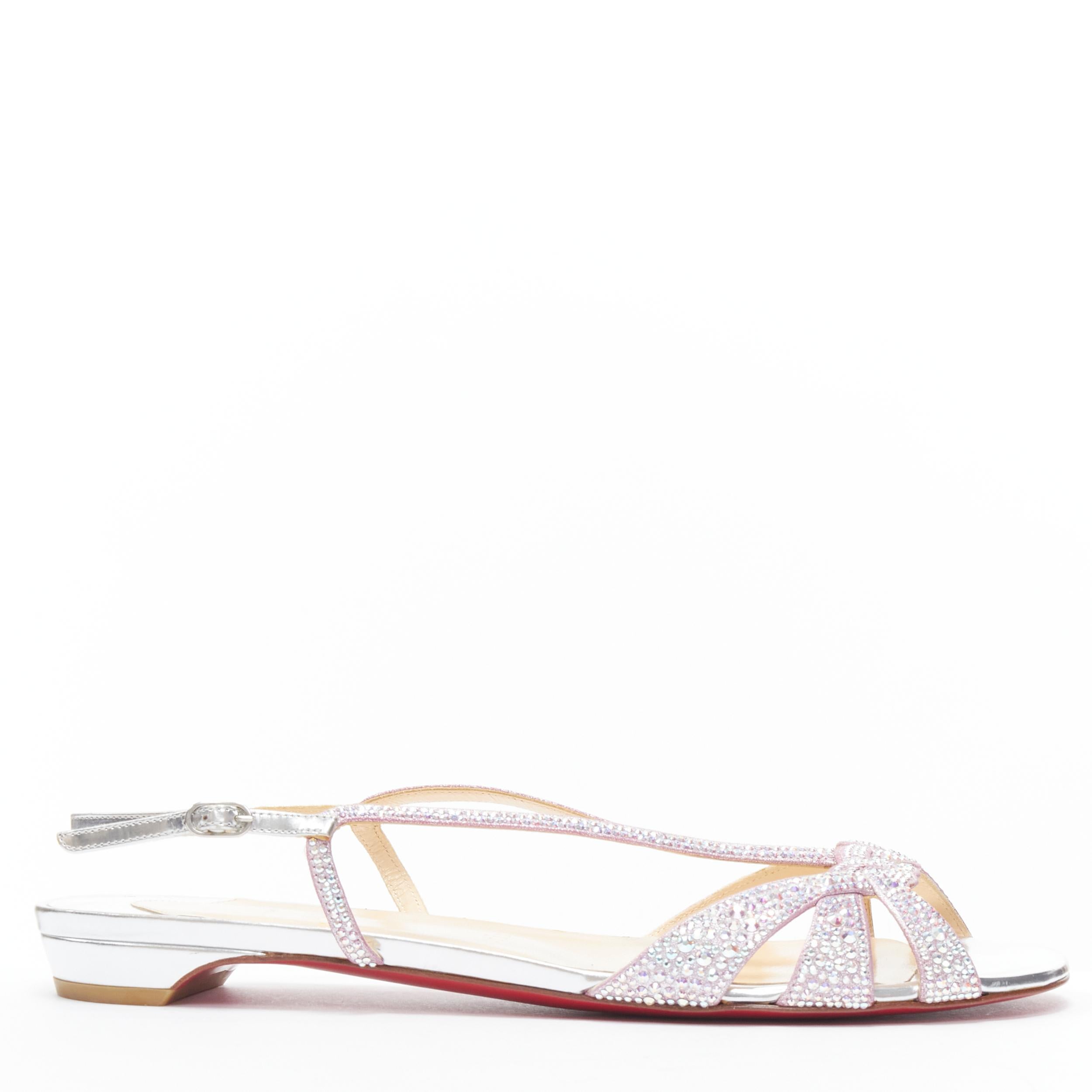 new CHRISTIAB LOUBOUTIN Lady Strass crystal embellished flat sandals EU39 
Reference: TGAS/B01512 
Brand: Christian Louboutin 
Designer: Christian Louboutin 
Model: Lady Strass sandals 
Material: Leather 
Color: Silver 
Pattern: Solid 
Closure: