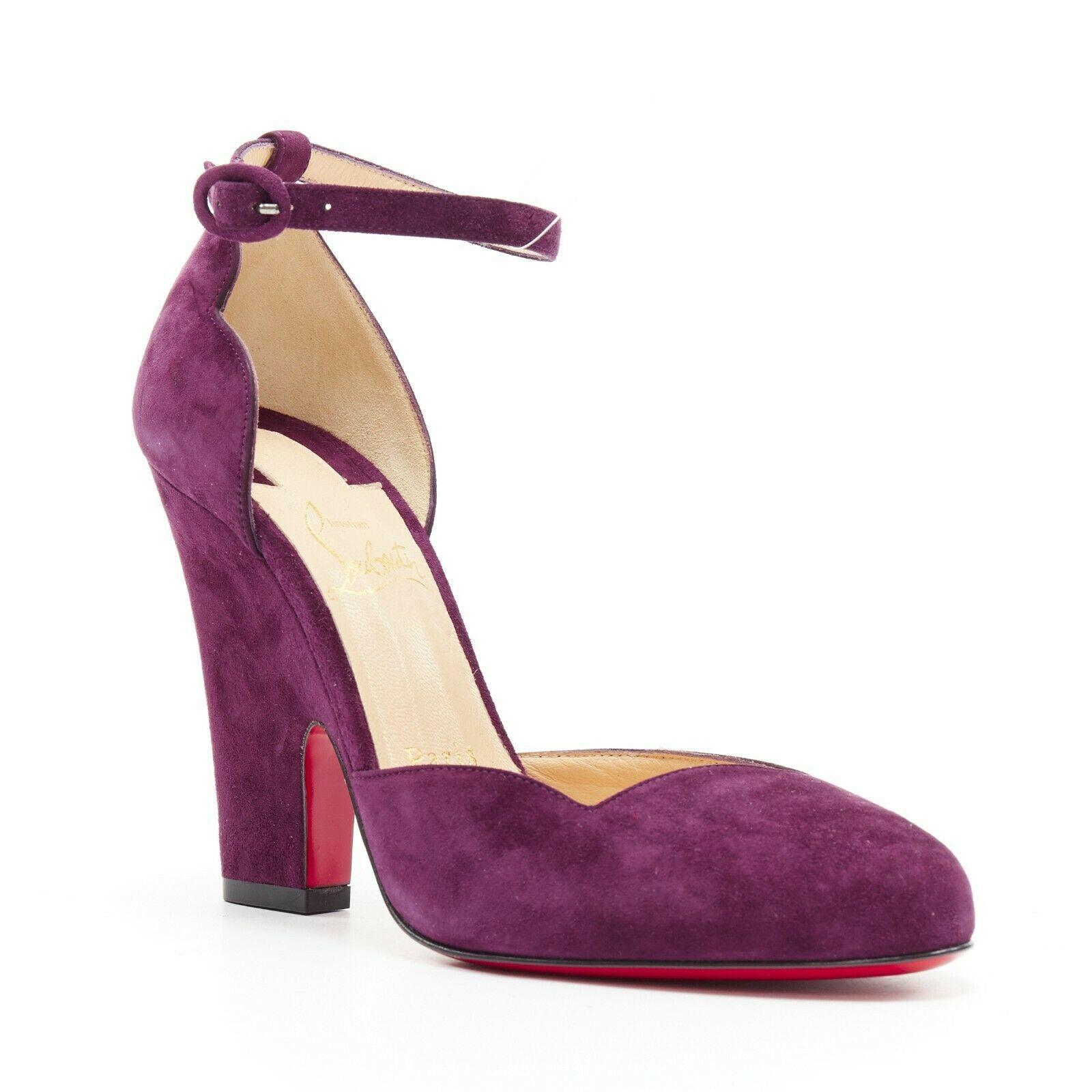 new CHRISTIAN LOUBOUTIN Aketi 100 purple suede scallop ankle strap heel EU37
CHRISTIAN LOUBOUTIN
Aketi 100. Purple suede leather upper.
 Scalloped wavy top line. Ankle strap. Almond round toe. 
Chunky high heel. Padded tan leather lining. 
Signature