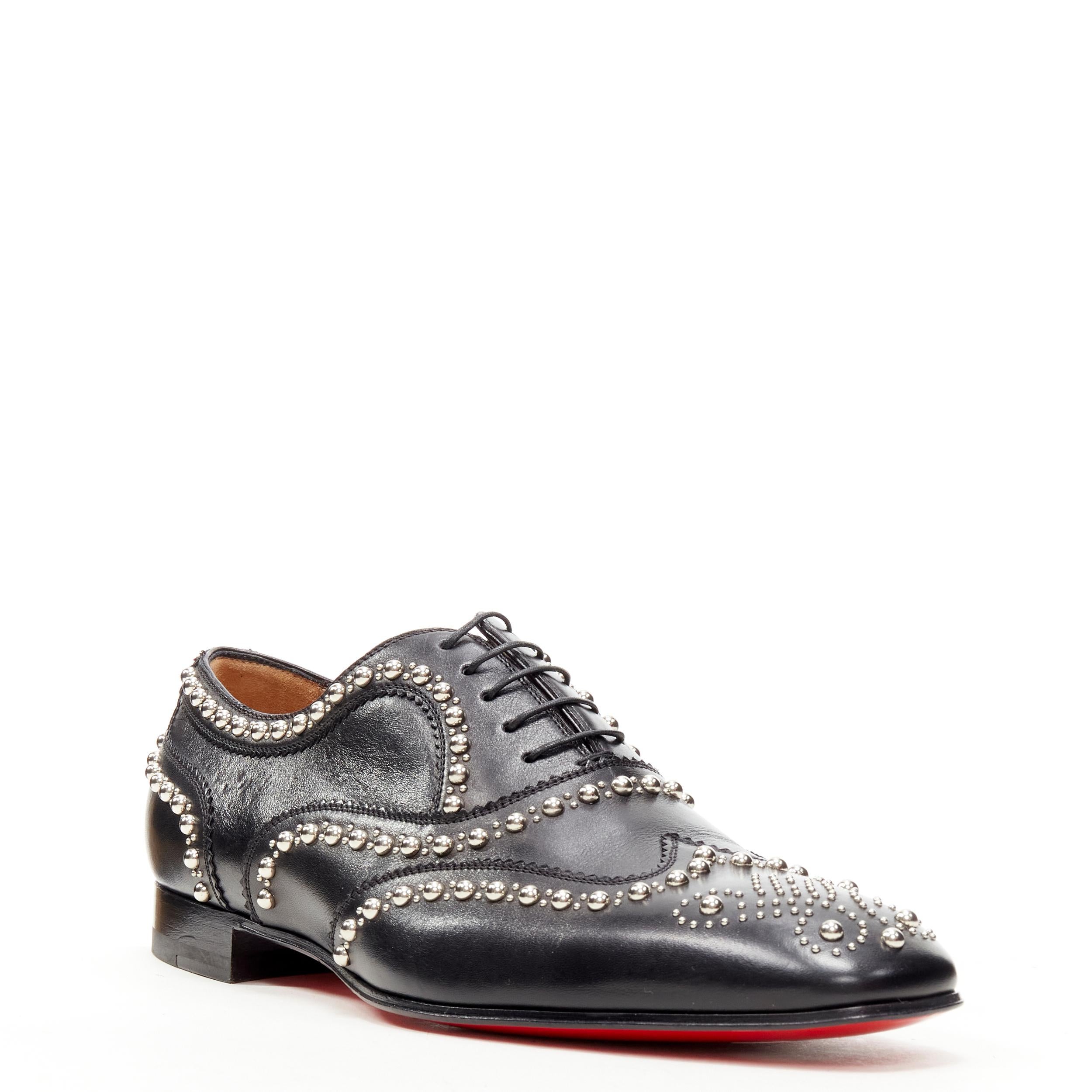 new CHRISTIAN LOUBOUTIN Charlie Clou black silver studded oxford brogue EU42.5 
Reference: TGAS/C01115 
Brand: Christian Louboutin 
Designer: Christian Louboutin 
Model: Charlie Clou 
Material: Leather 
Color: Black 
Pattern: Solid 
Closure: Lace Up