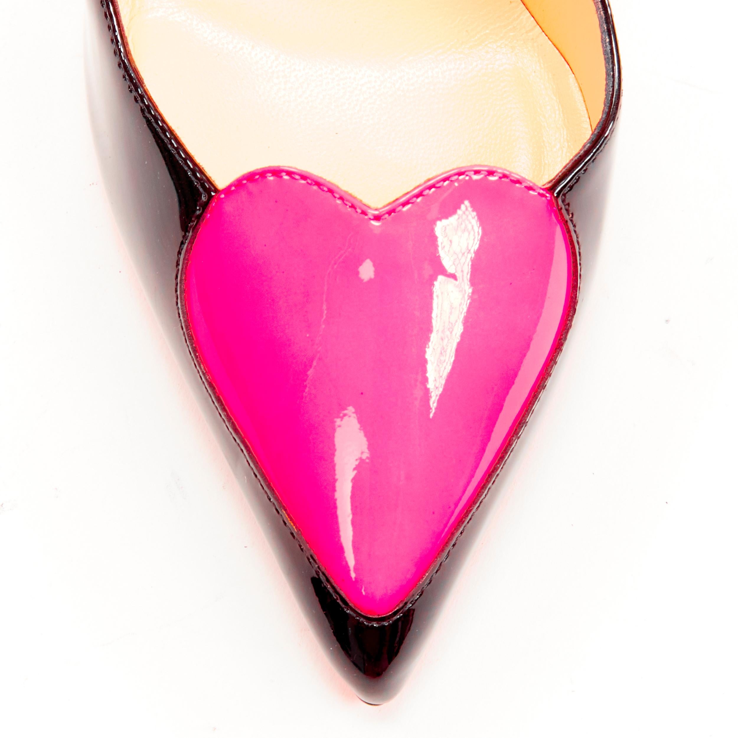 new CHRISTIAN LOUBOUTIN Corafront 100 black neon pink heart patent pump EU36 
Reference: TGAS/C01123 
Brand: Christian Louboutin 
Designer: Christian Louboutin 
Model: Corafront 100 
Material: Patent Leather 
Color: Black 
Pattern: Solid 
Extra