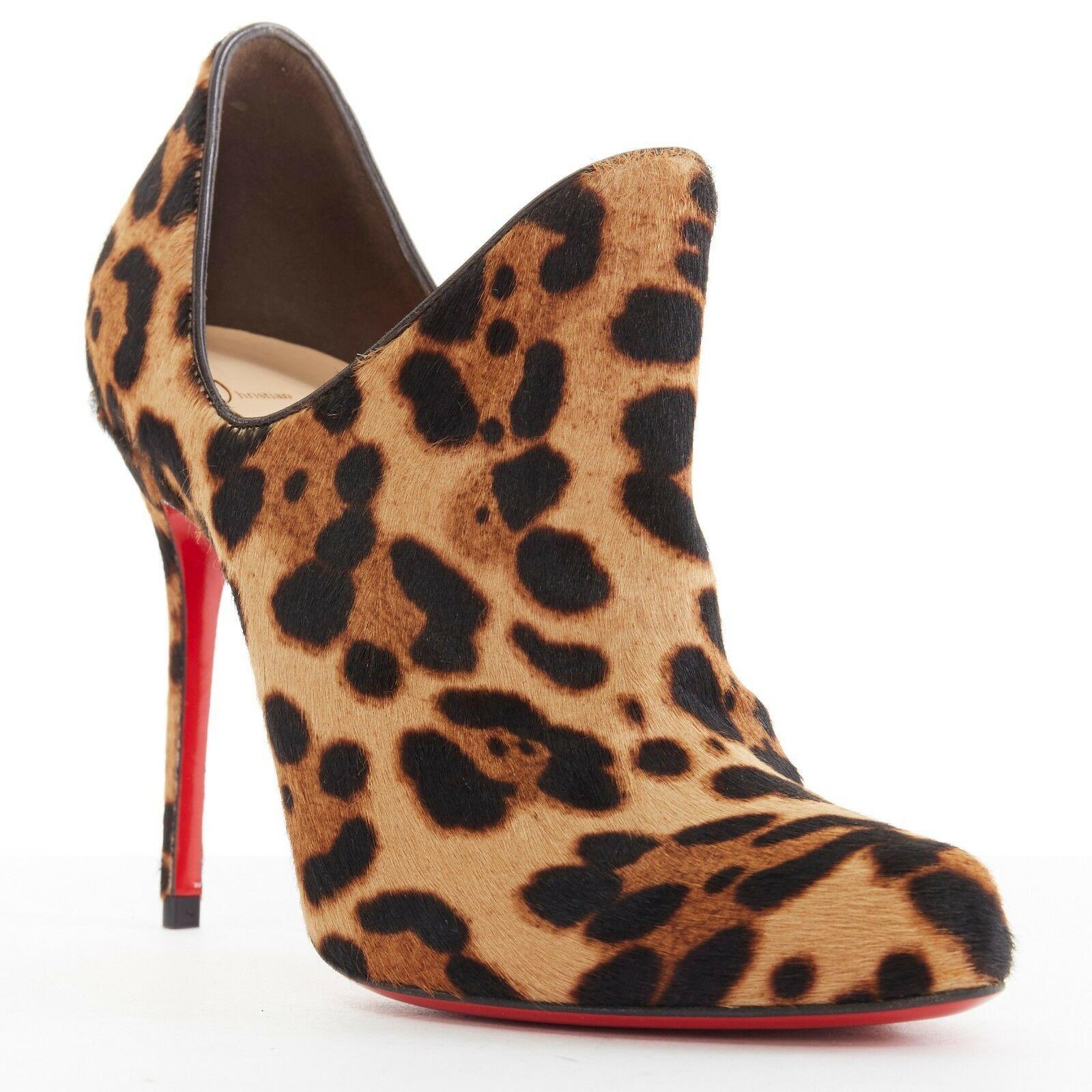 new CHRISTIAN LOUBOUTIN Dugueclina 100 leopard calf dipped stiletto bootie EU37
CHRISTIAN LOUBOUTIN
Leopard print calf hair leather. Dipped cut out side. 
Tonal stitching. Almond toe. Covered heel. Stiletto high heel. 
Tan leather lining. Padded