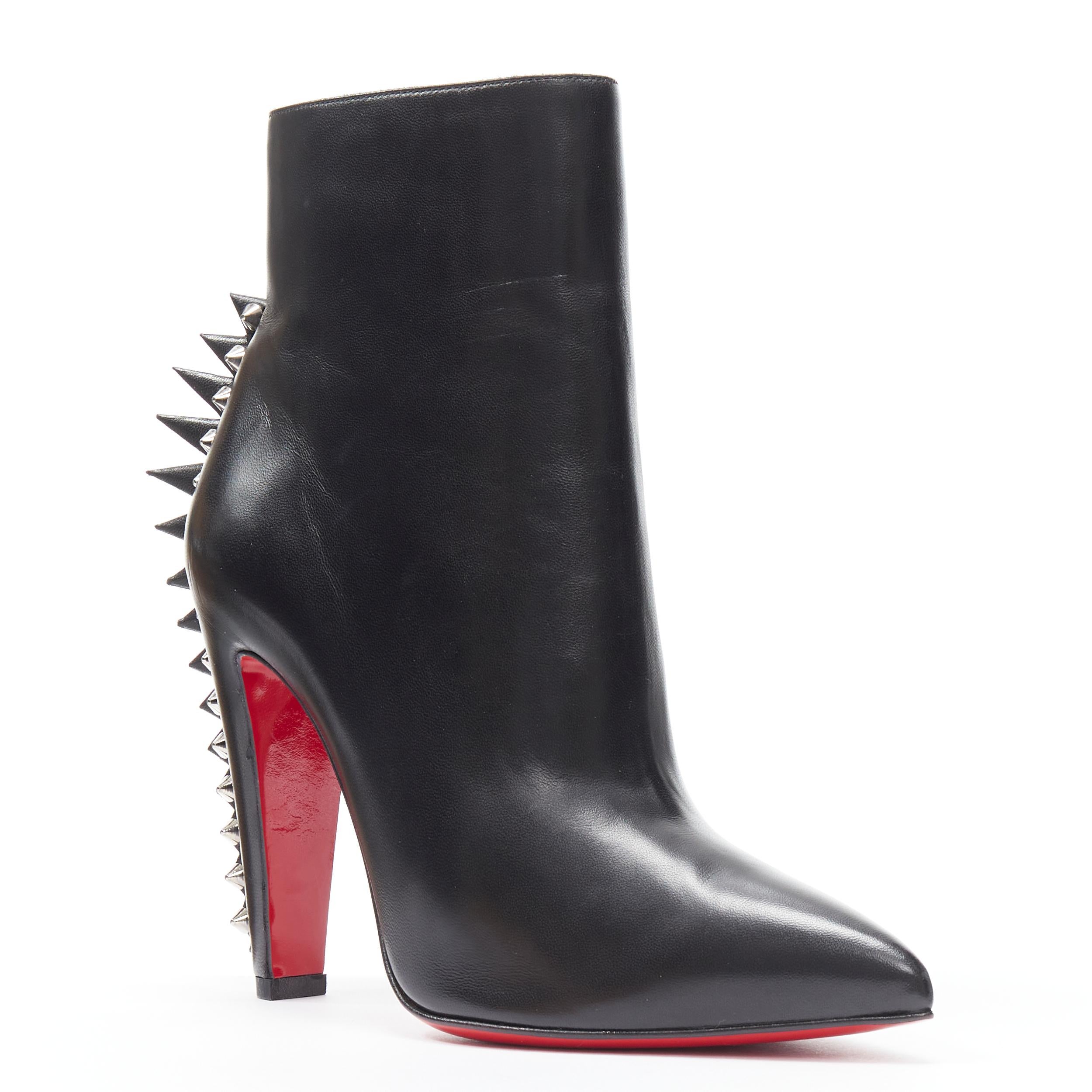 new CHRISTIAN LOUBOUTIN Electroboot 100 black spike punk mohawk boot EU37.5 Reference: TGAS/B01269 
Brand: Christian Louboutin 
Designer: Christian Louboutin 
Material: Leather 
Color: Black 
Pattern: Solid 
Closure: Zip 
Extra Detail: Electroboot