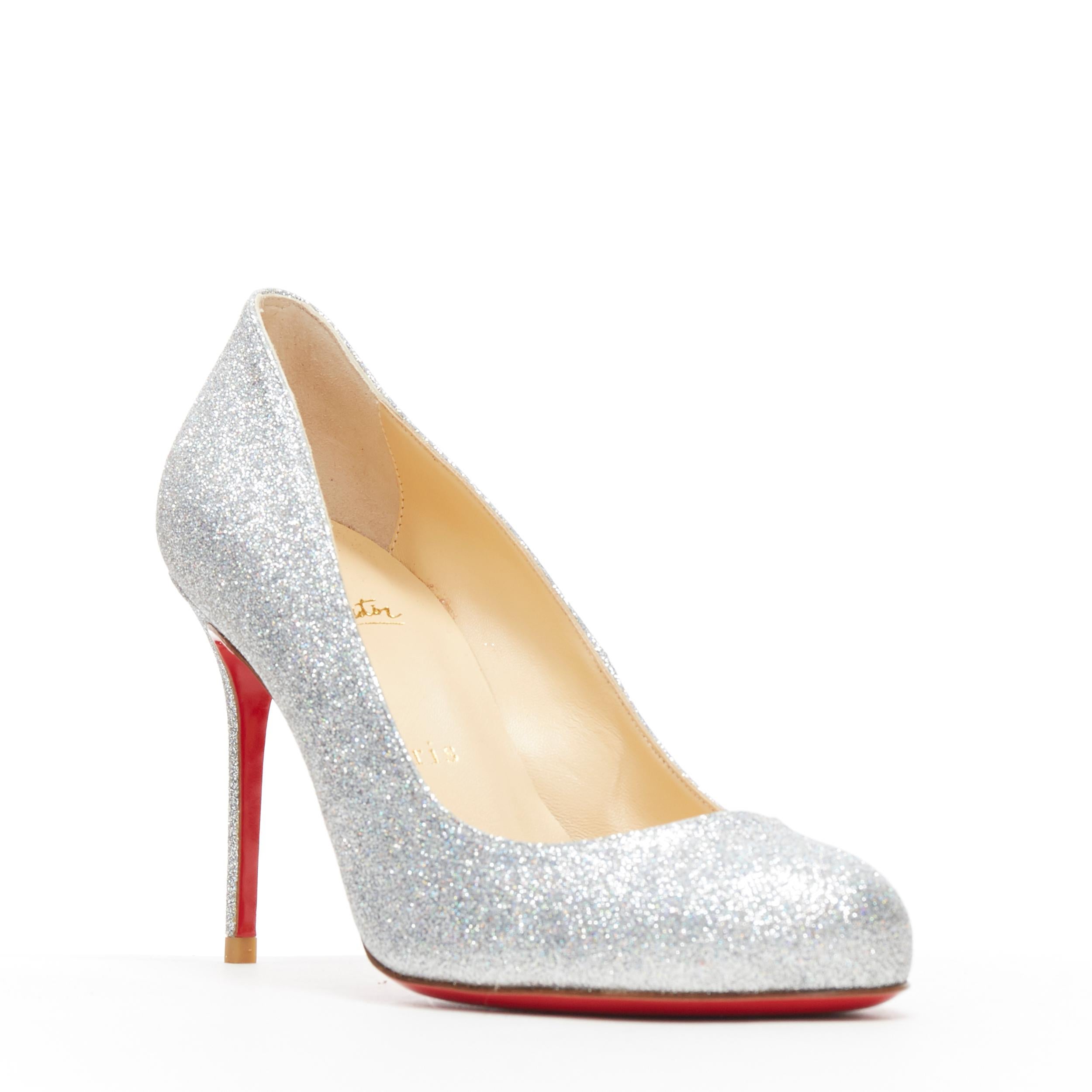 new CHRISTIAN LOUBOUTIN Fifi 85 silver glitter round toe slim heel pump EU37
Brand: Christian Louboutin
Designer: Christian Louboutin
Model Name / Style: Fifi 85
Material: Leather
Color: Silver
Pattern: Solid
Extra Detail: High (3-3.9 in) heel