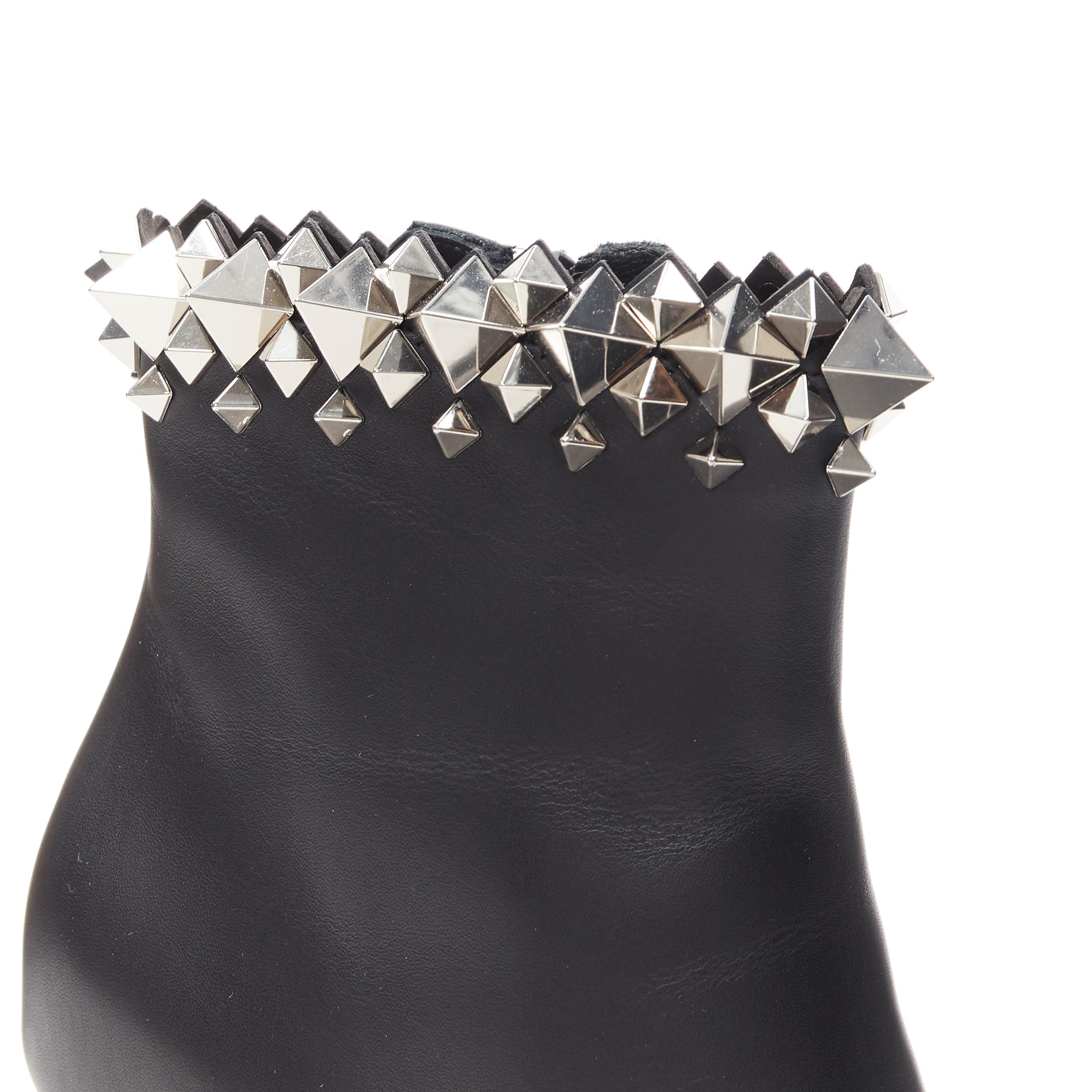 new CHRISTIAN LOUBOUTIN Firmamma 85 black leather stud cuff ankle bootie EU38.5 Reference: TGAS/B00243 
Brand: Christian Louboutin 
Designer: Christian Louboutin 
Material: Leather 
Color: Black 
Pattern: Solid 
Closure: Zip 
Made in: Italy