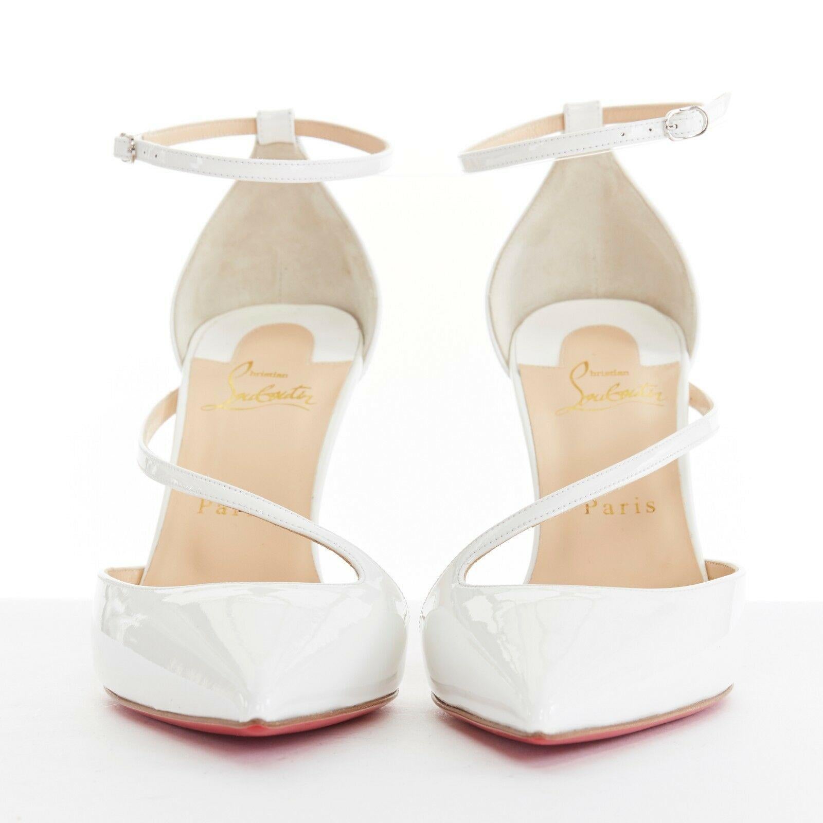 new CHRISTIAN LOUBOUTIN Fliketta 85 white patent cross strap dorsay pump EU38.5
CHRISTIAN LOUBOUTIN
Fliketta 85. White patent leather. 
Dorsay silhouette. Cross over strap at vamp. 
overed heel. Ankle strap. Silver-tone metal buckle. 
Pointed toe.