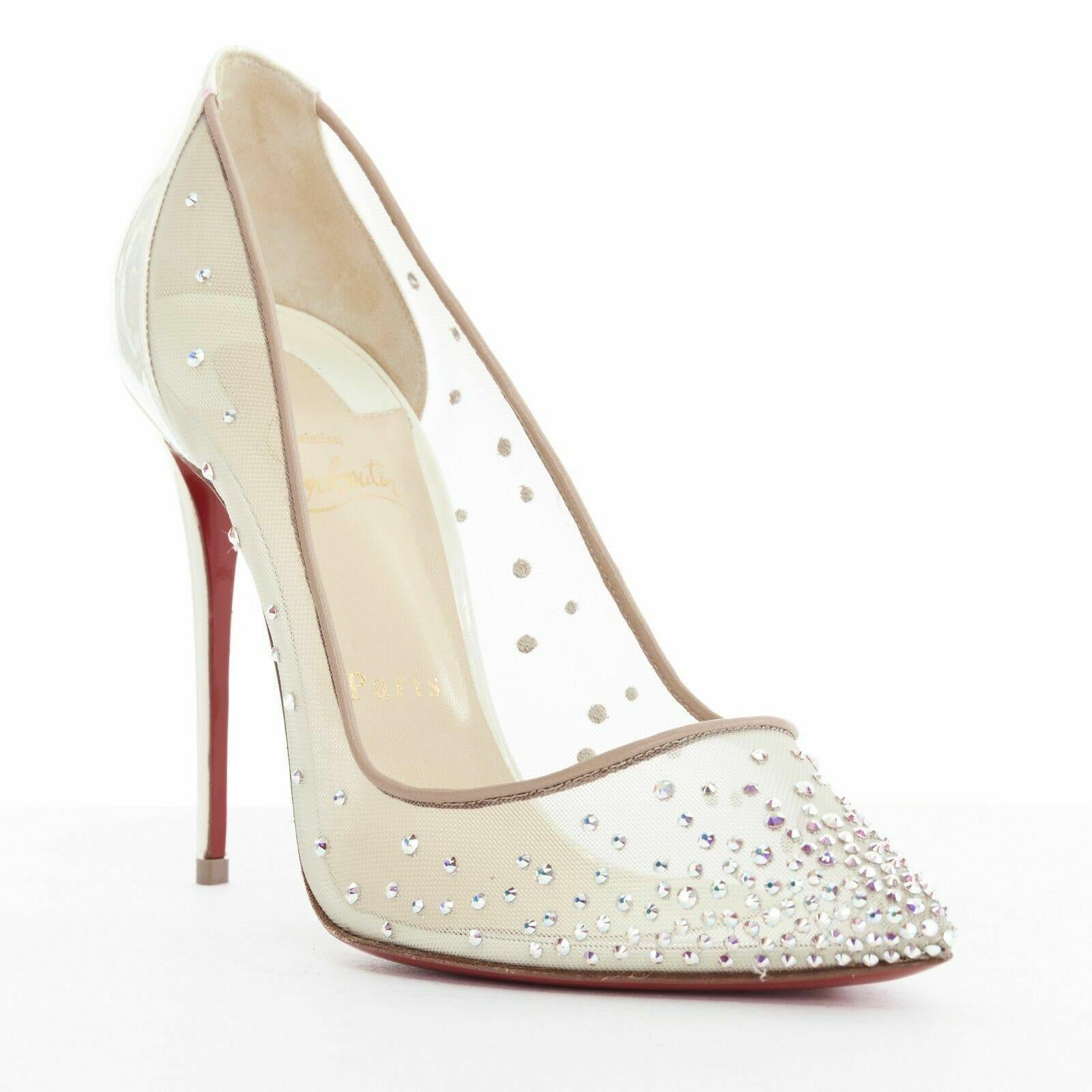new CHRISTIAN LOUBOUTIN Follies Strass crystal mesh pearl bridal pumps EU41
Brand: Christian Louboutin
Designer: Christian Louboutin
Model Name / Style: Follies Strass
Material: Patent leather
Color: White; pearl iridescent
Pattern: Solid
Extra