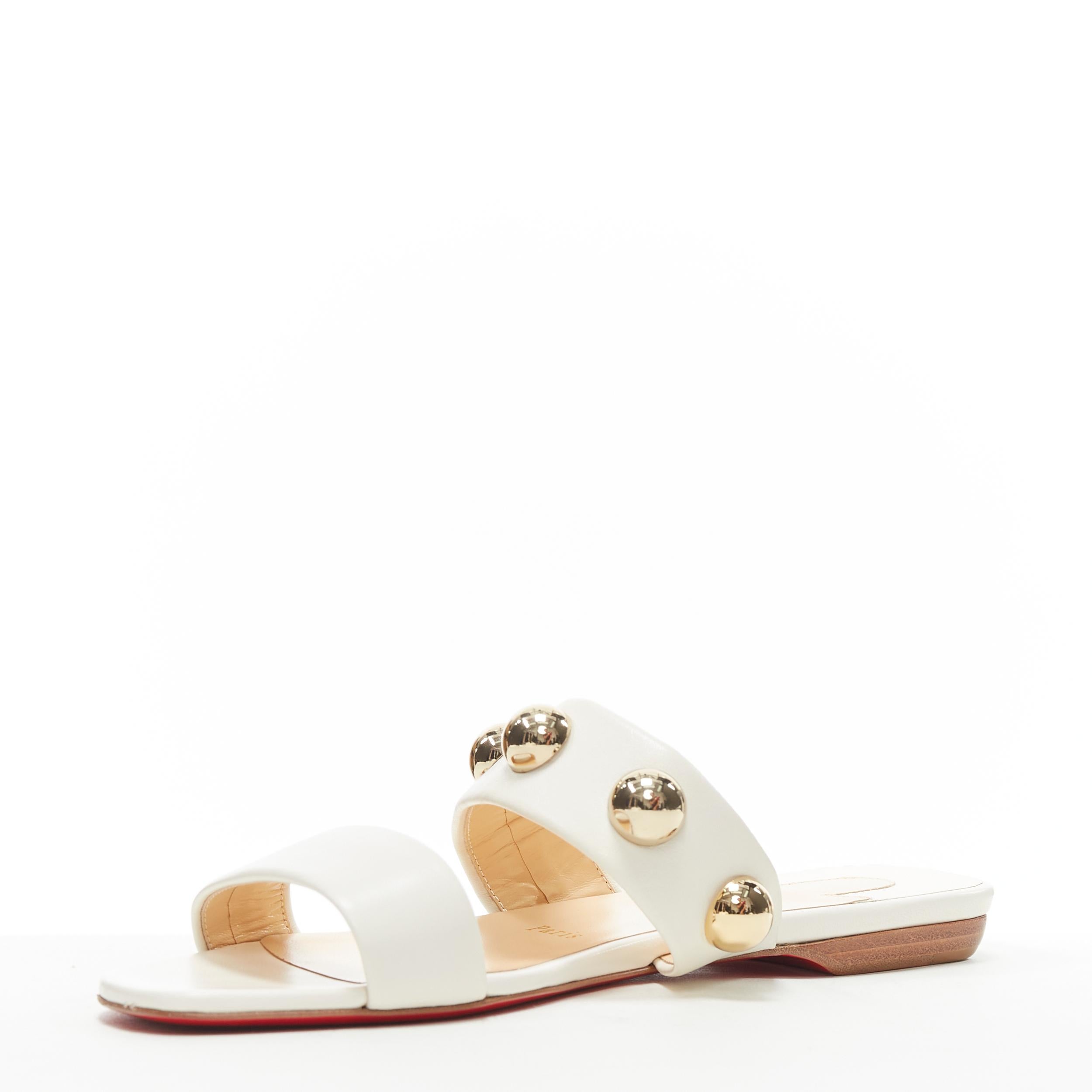 new CHRISTIAN LOUBOUTIN gold dome sphere stud white leather flat sandals EU37.5 In New Condition In Hong Kong, NT