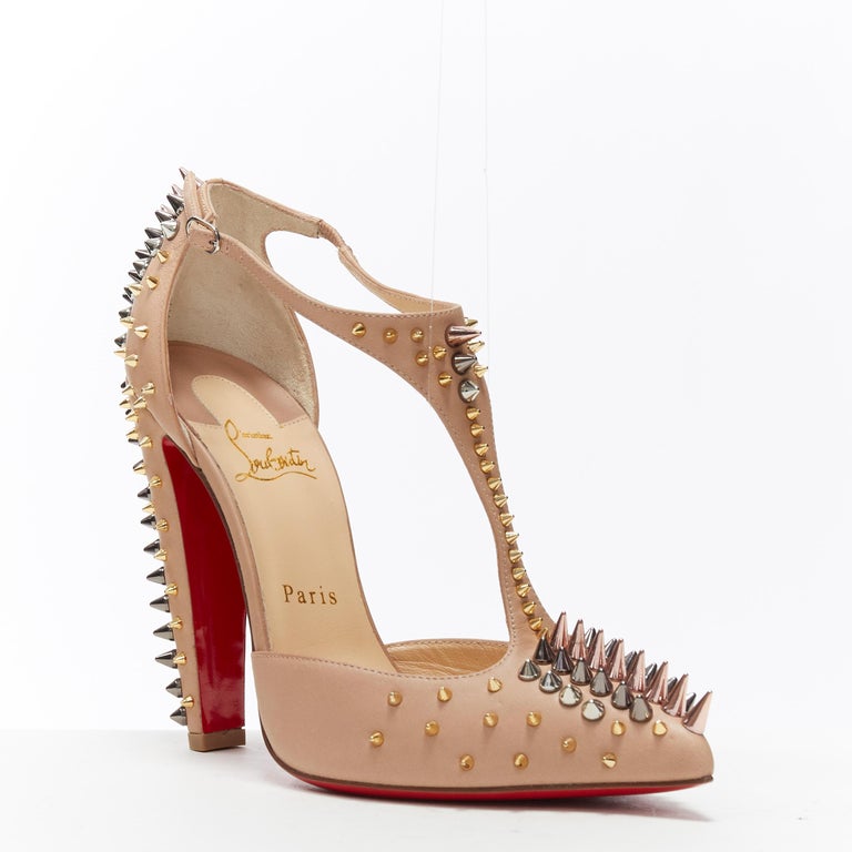 new CHRISTIAN LOUBOUTIN Goldoscrap nude spike stud T-strap pointed pump EU38.5
Brand: Christian Louboutin
Designer: Christian Louboutin
Collection: 2016
Model Name / Style: Goldoscrap 120
Material: Leather
Color: Beige
Pattern: Solid
Closure: