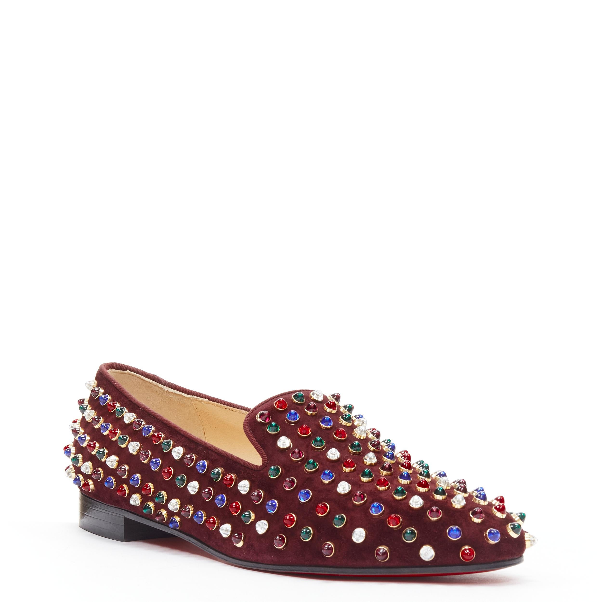 new CHRISTIAN LOUBOUTIN Jewel tone Gripoix stud burgundy red suede loafer EU39.5 
Reference: TGAS/B01965 
Brand: Christian Louboutin 
Designer: Christian Louboutin 
Material: Suede 
Color: Burgundy 
Pattern: Solid 
Extra Detail: Grosgrain piping.