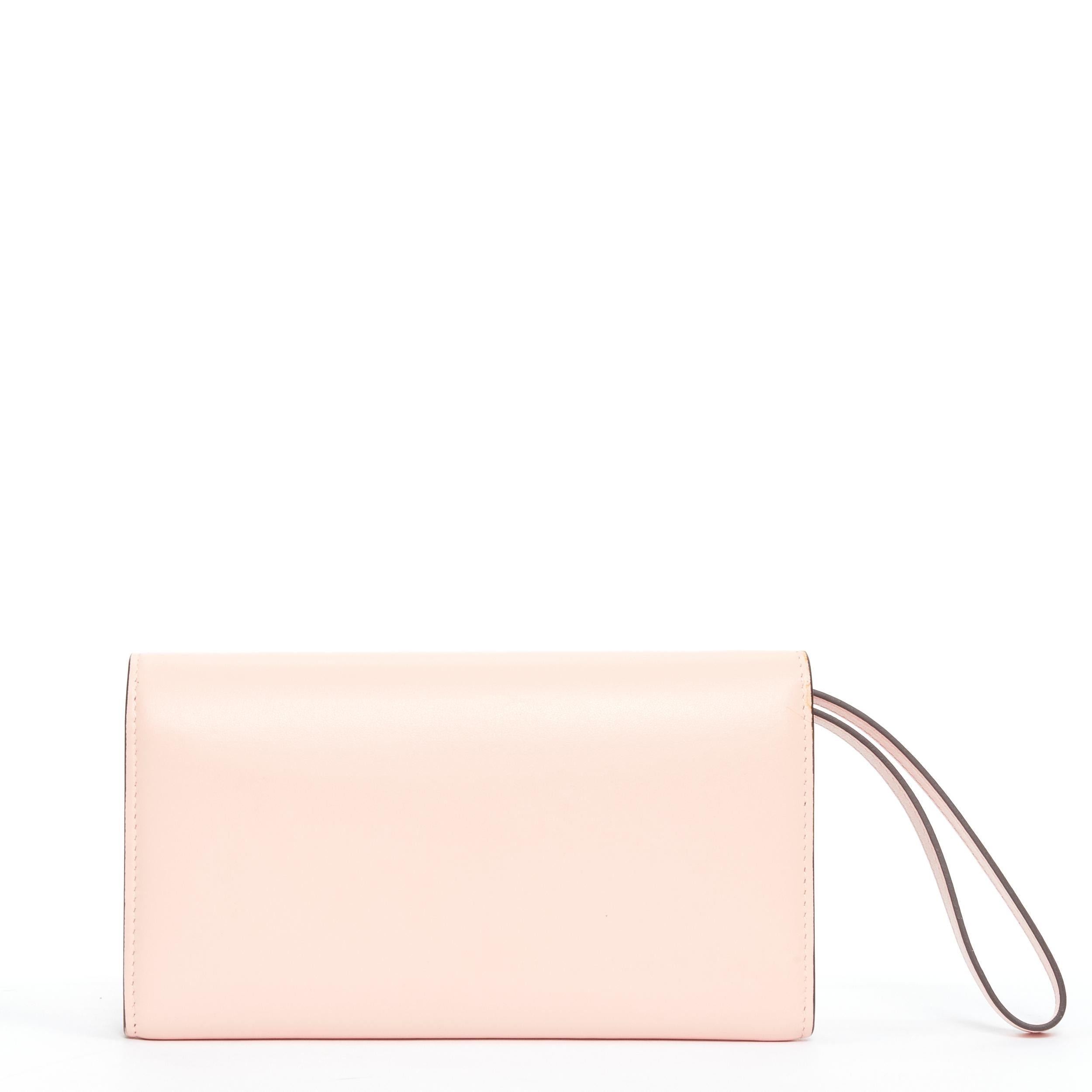 new CHRISTIAN LOUBOUTIN Macaron pink gold spike stud flap wallet clutch bag 
Reference: TGAS/B01397 
Brand: Christian Louboutin 
Designer: Christian Louboutin 
Material: Leather 
Color: Pink 
Pattern: Solid 
Closure: Button 
Extra Detail: Macaron