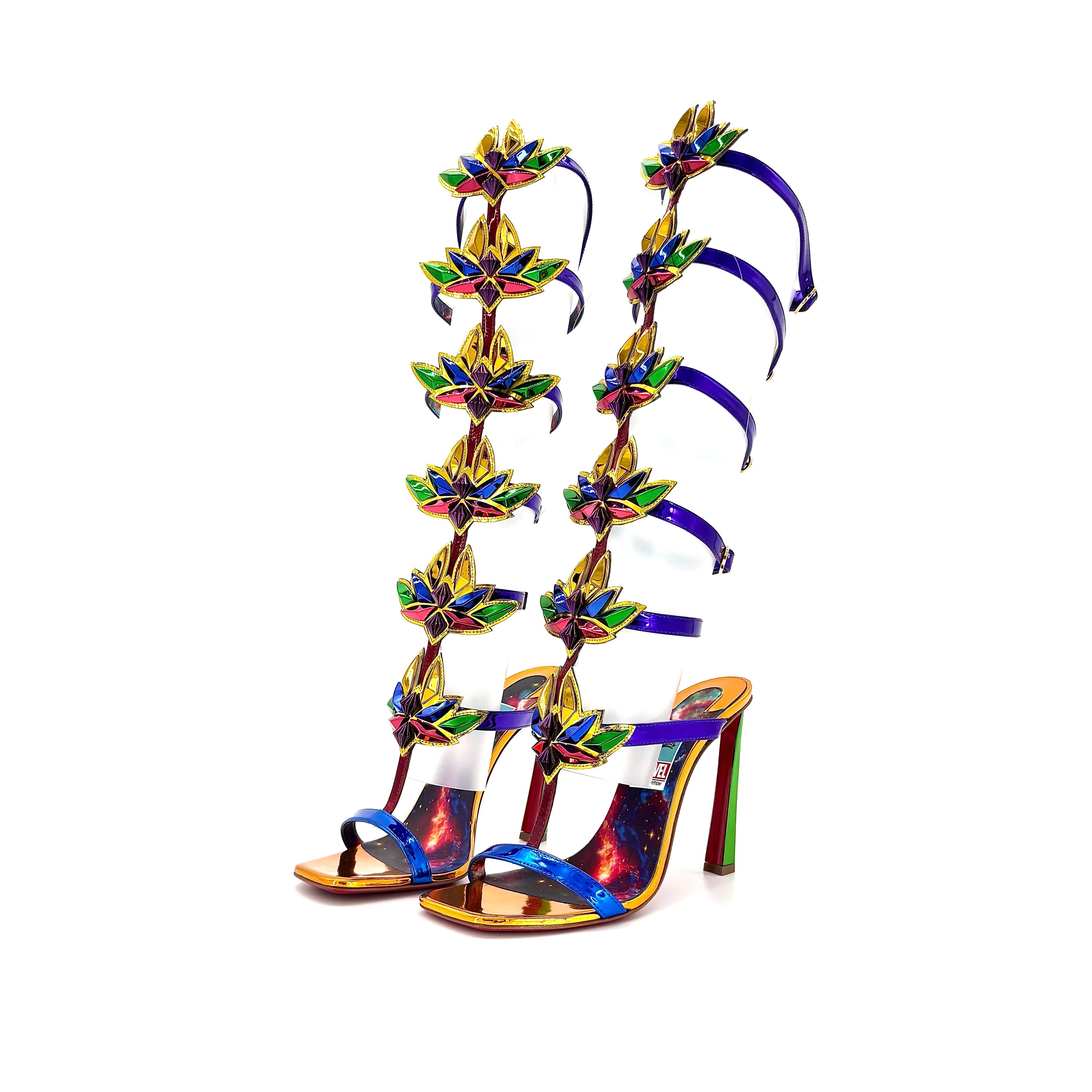 Christian Louboutin x Marvel Sea Warrior 100 Gladiator Knee High Sandals 

Couleur Multi
Taille 39EU
Hauteur du talon 100 mm

Dessus en cuir verni métallisé
Semelle en cuir
Collaboration Marvel collection en édition limitée
Embellissement en pierres