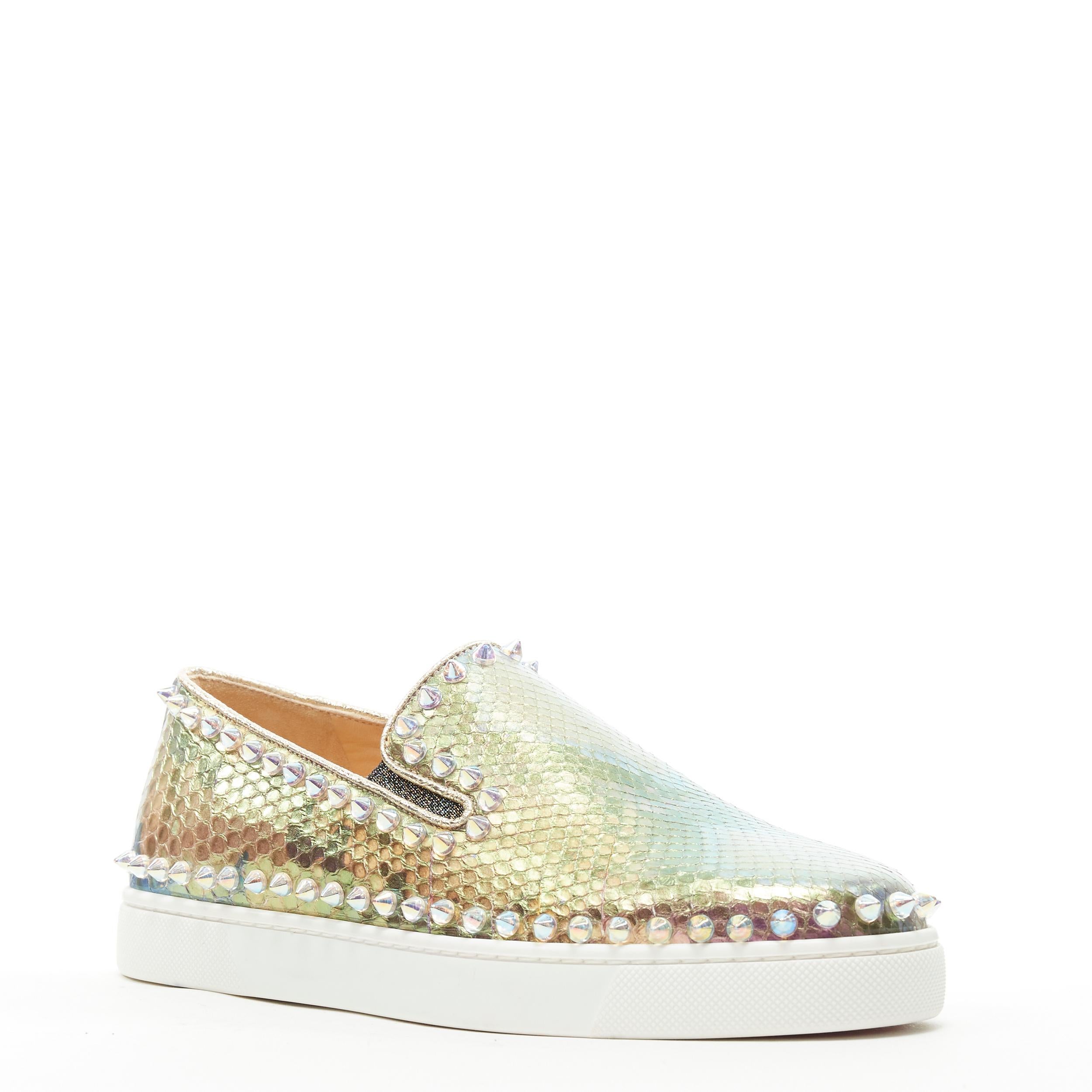 new CHRISTIAN LOUBOUTIN Pik Boat iridescent leather spike stud sneaker EU37 
Reference: TGAS/B00732 
Brand: Christian Louboutin 
Designer: Christian Louboutin 
Model: Pik Boat python 
Material: Leather 
Color: Green 
Pattern: Solid Extra Detail: