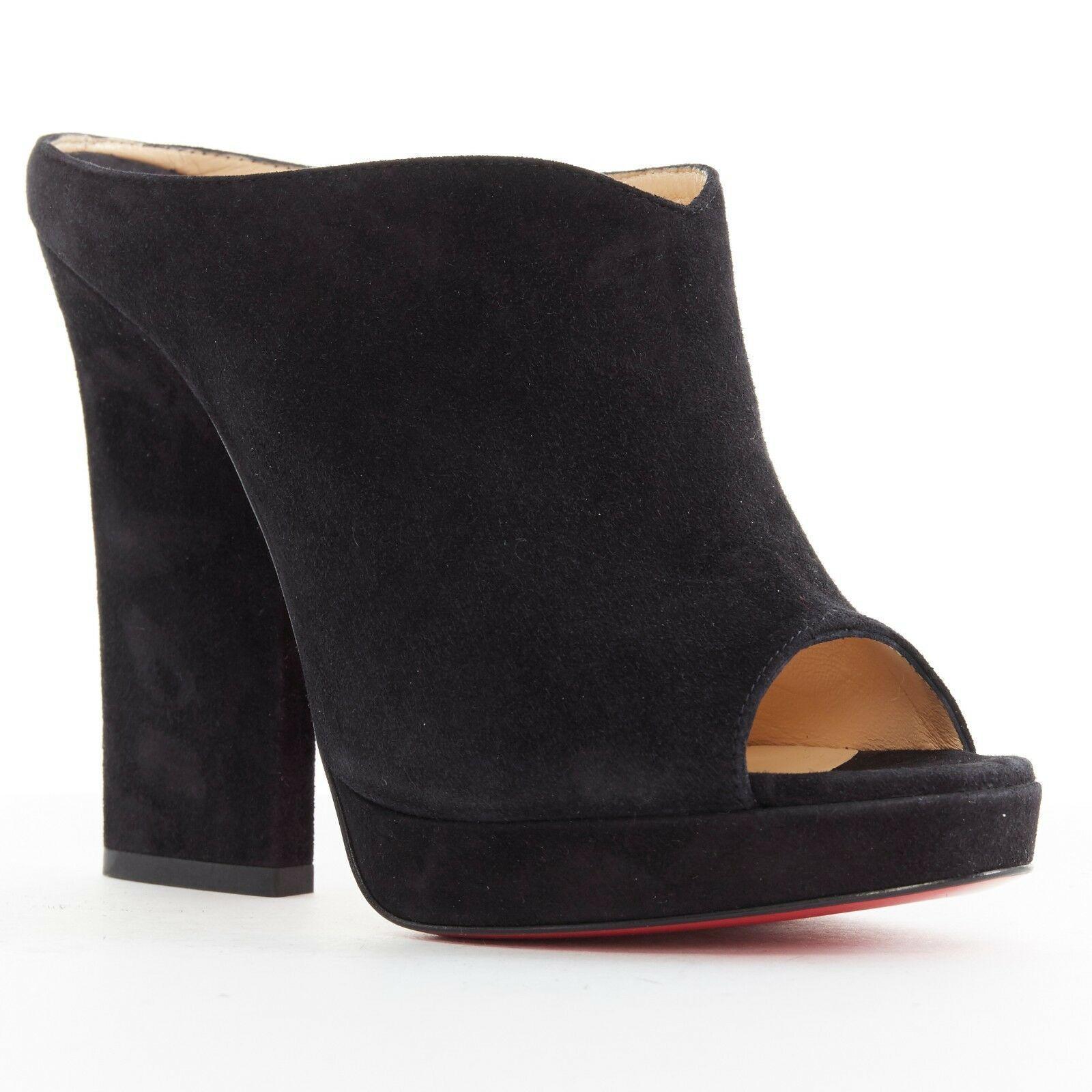 new CHRISTIAN LOUBOUTIN Roche Mule 120 black suede open toe chunky heels EU37
CHRISTIAN LOUBOUTIN
Roche Mule 120. 
Black suede leather upper. 
Open toe. 
Chunky heel. 
Slip on mule. 
Signature red lacquered leather sole. 
Padded insole. 
Tan leather