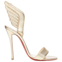 nuevo CHRISTIAN LOUBOUTIN Samotresse 100 sandalias de alas laminadas de napa dorada EU38