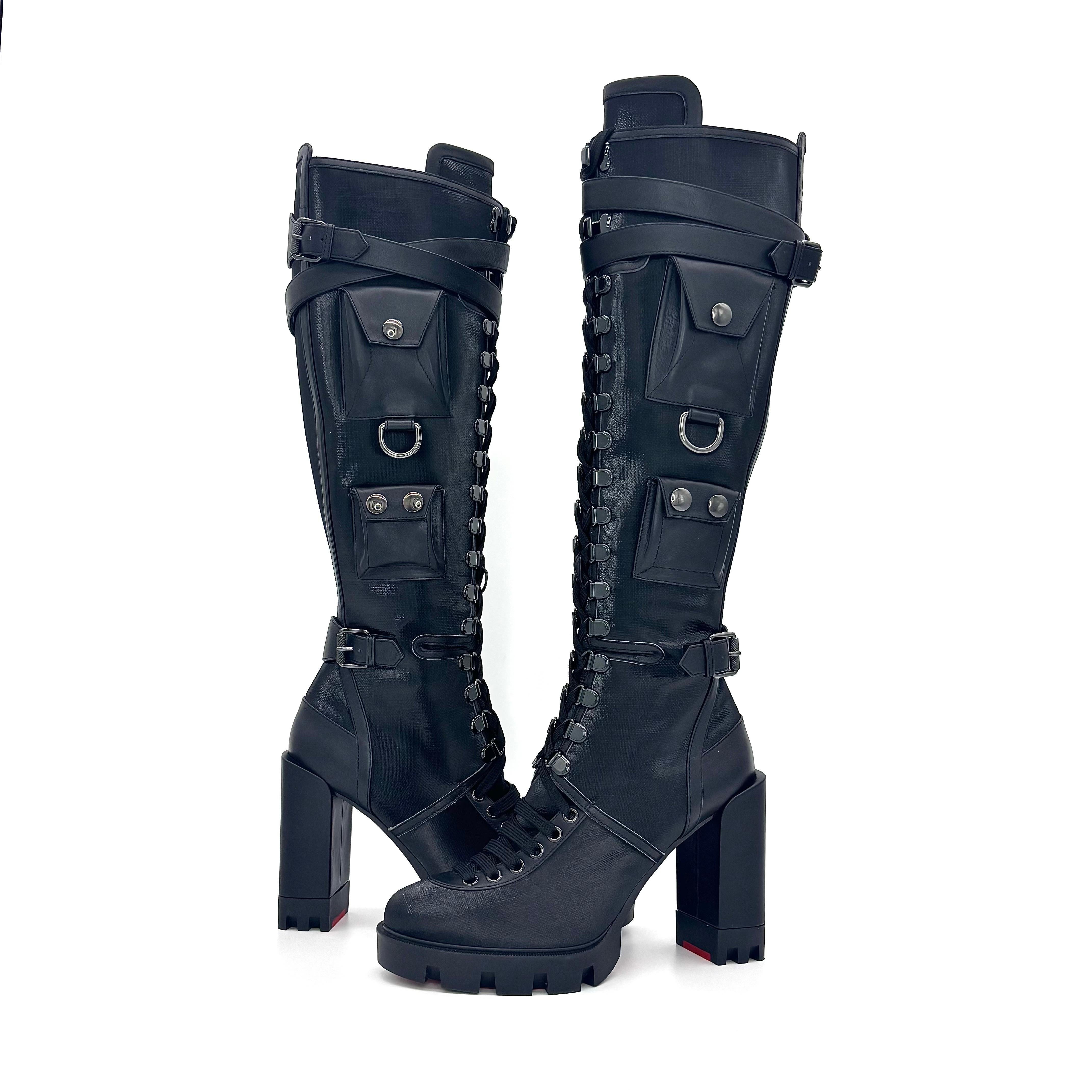 Christian Louboutin Sand And Glory 100 Knee High Boots
New, no original box 
Color Black
Size 39.5EU
Mixed material upper
Signature red bottom sole
Round toe
Hidden side full zip
Knee high shaft height
High block platform heel
Buckle embellishments