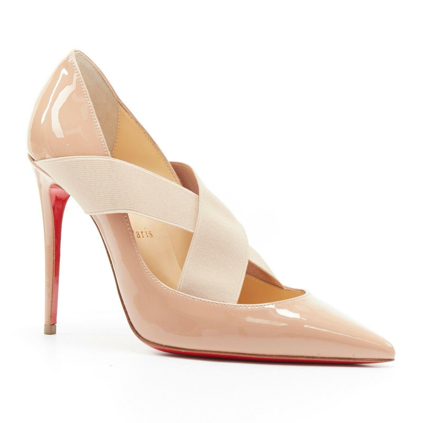 new CHRISTIAN LOUBOUTIN Sharpstagram 100 nude cross strap pointy pigalle EU36
CHRISTIAN LOUBOUTIN
Sharpstagram 100. 
Nude patent leather upper. 
Nude elasticated criss cross straps at vamp. 
Pointed toe. 
Stiletto heel. 
Padded tan leather lining.