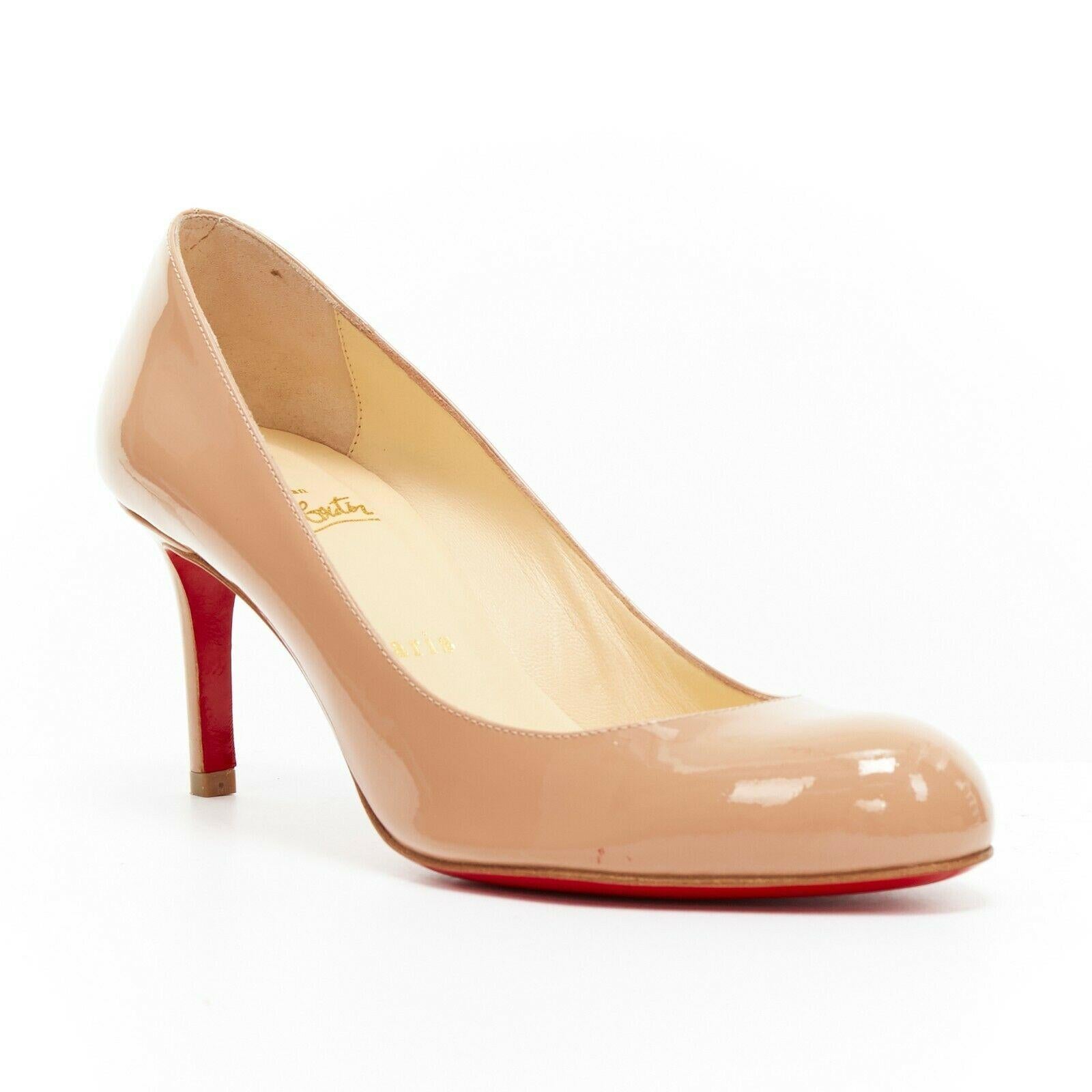 new CHRISTIAN LOUBOUTIN Simple Pump 70 nude patent round toe mid heel EU38
CHRISTIAN LOUBOUTIN
Simple Pump 70. 
Nude patent calf leather. 
Round toe. 
Tonal stitching. 
Slim mid heel. 
Padded tan leather lining. 
Signature Christian Louboutin red