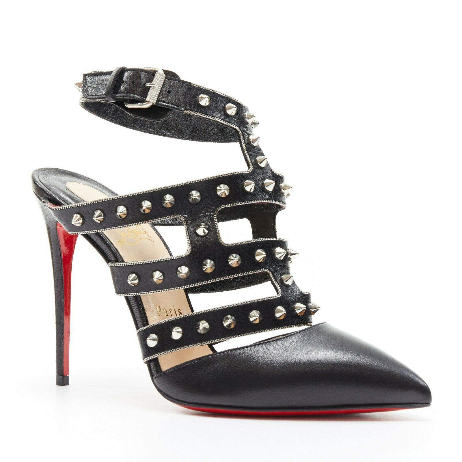 new CHRISTIAN LOUBOUTIN Tchicaboum 100 black spike stud chain trimmed pump EU37
CHRISTIAN LOUBOUTIN
Tchicaboum 100. 
Black leather upper. 
Silver-tone hardware. 
Spike stud embellishment. 
Silver fine chain trimming. 
Pointed toe. 
Cut out design.